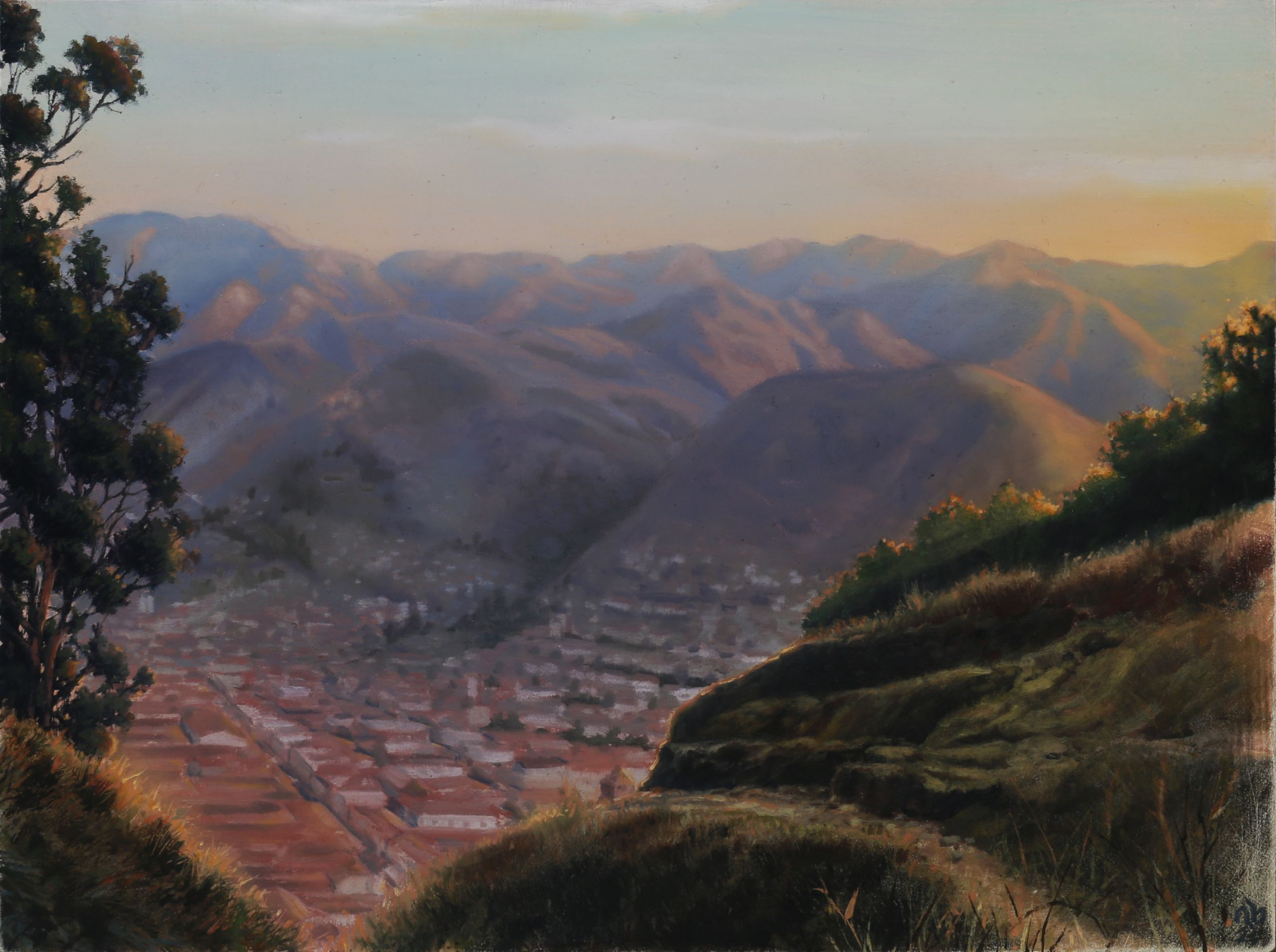 Wide landscape painting of the city of Cusco below layered purple mountains, framed by dark trees and sunlit grassy slopes beneath a pale golden sky.