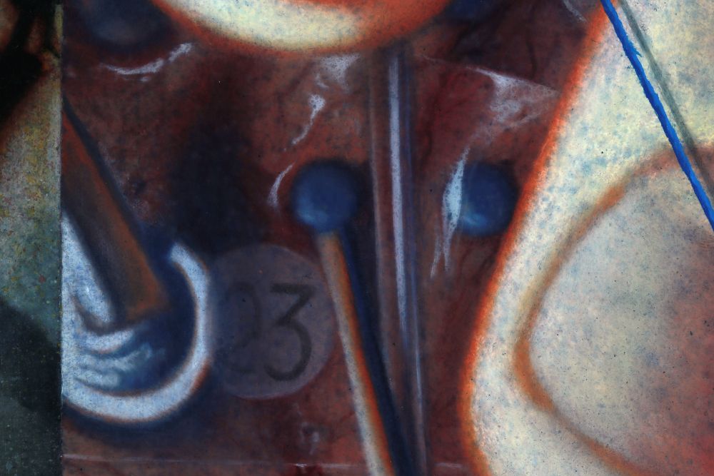 Close detail of dark red geometric forms with two blue circles, the numeral three, pale curved areas, and a diagonal blue line.