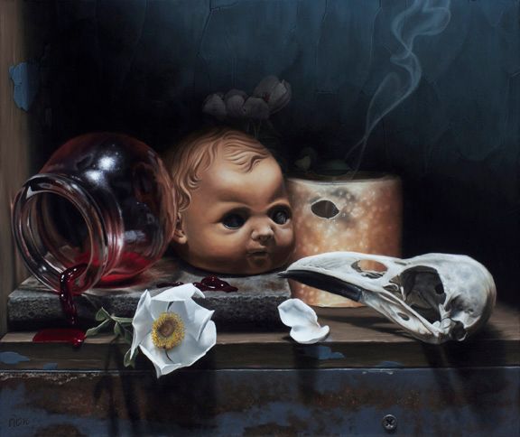 A dark still-life painting shows a doll’s head beside a smoking candle, tipped glass jar spilling red blood, white flower, and animal skull.