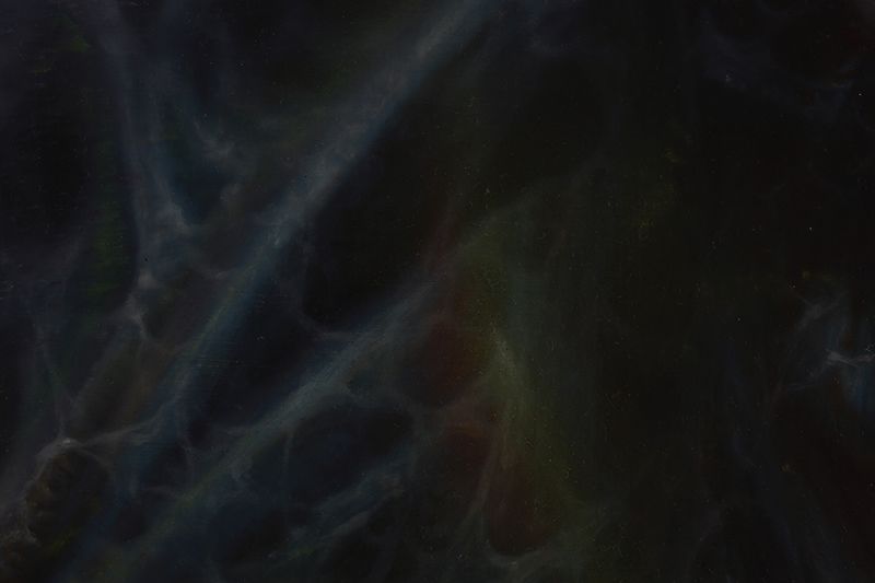 Dark abstract painting with smoky blue diagonal forms and faint green, red, and yellow patches emerging from a nearly black field.