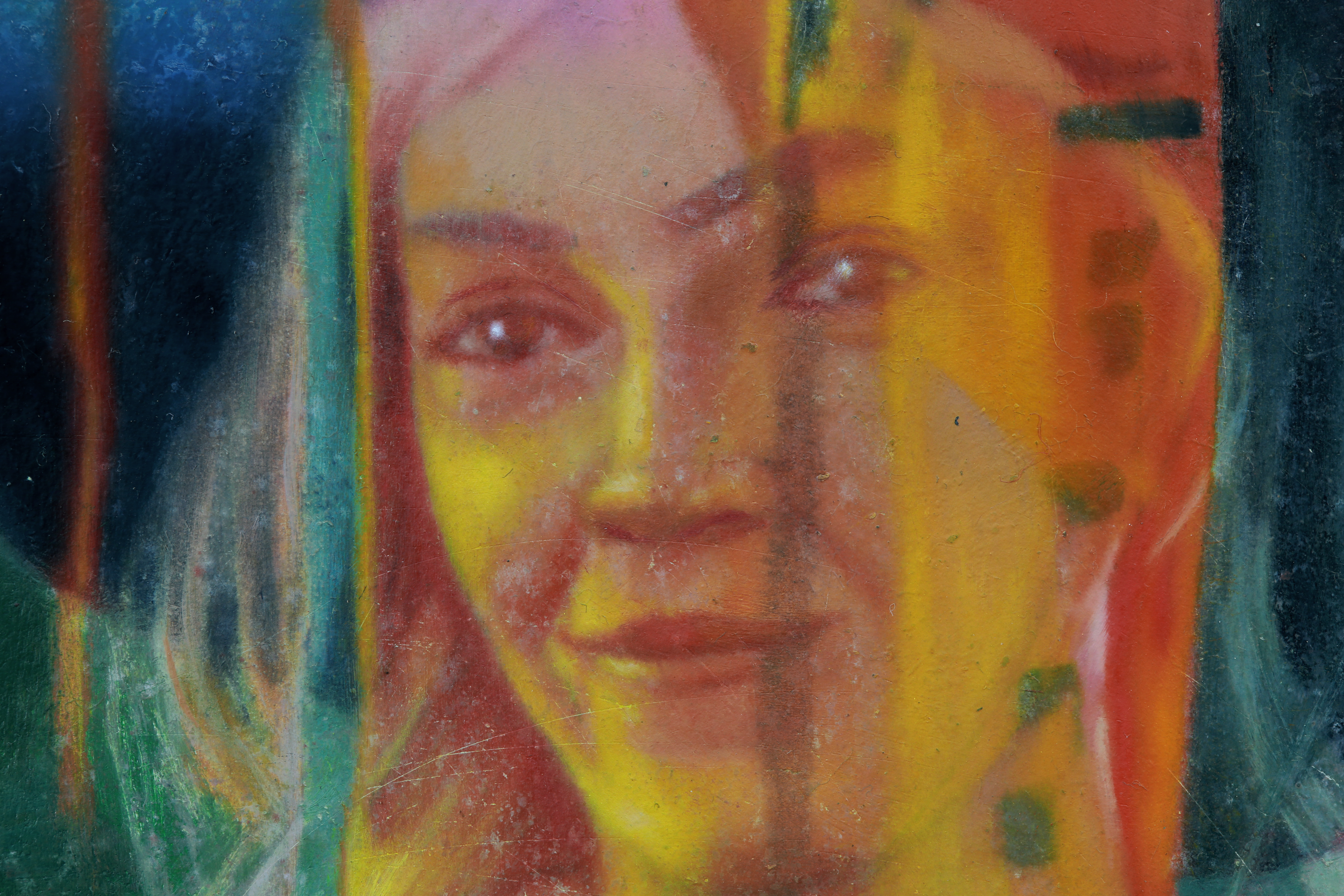 Close detail of blurred vertical and horizontal bands in navy, turquoise, red, orange, yellow, pink, and green with woman's face in gold.
