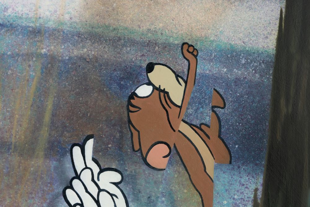 Close detail of a fragmented brown cartoon mouse raising one paw against a mottled blue-grey background, with white forms below and a dark edge.