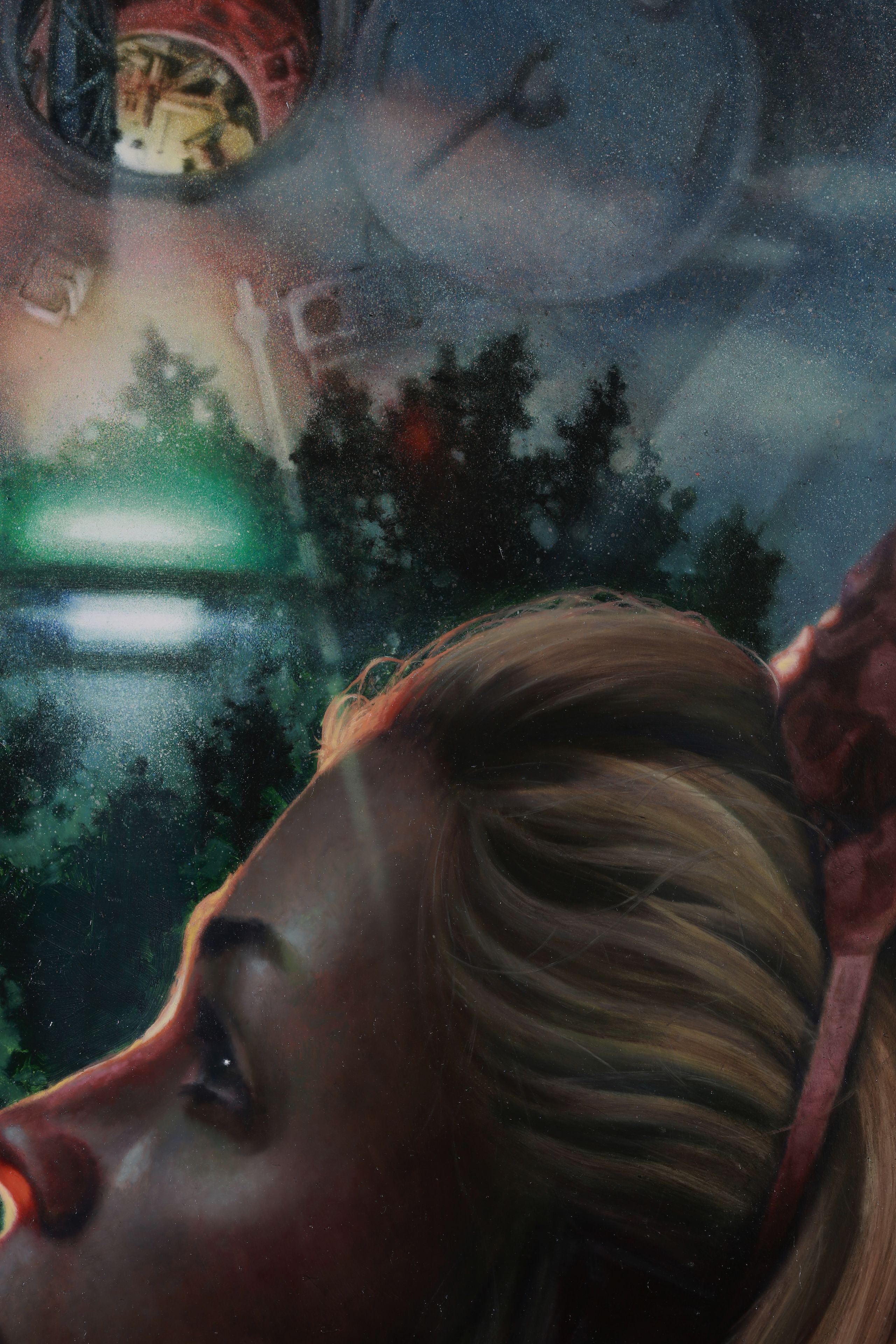 Close-up painting of an upturned face beneath a hazy night sky, dark tree silhouettes, glowing green lights.