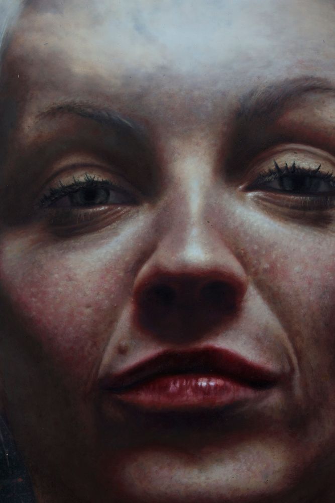 Close-up painting of a face with half-closed dark eyes, flushed skin, a shadowed nose, and glossy red lips.