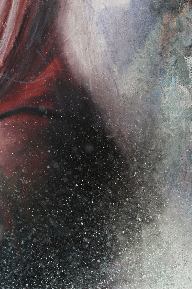 A close detail of red and black curved forms beside mottled blue-gray areas, densely layered with white speckles, scratches, and cloudy textures.