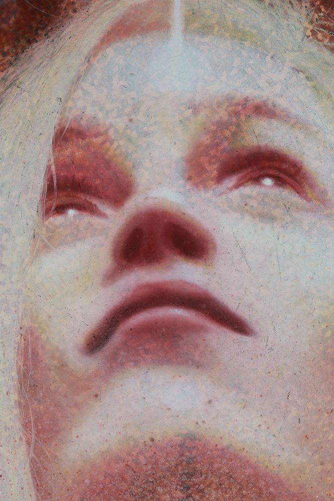 Close-up painting of an upturned face in pale pink tones, with open eyes, red lips, and mottled textures.