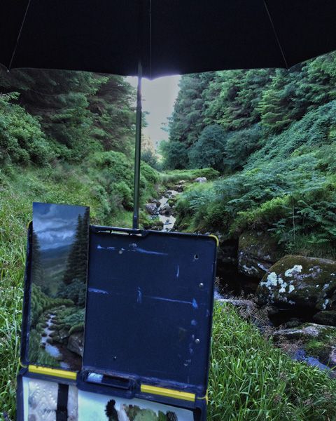 Keeping my painting out of the rain.
