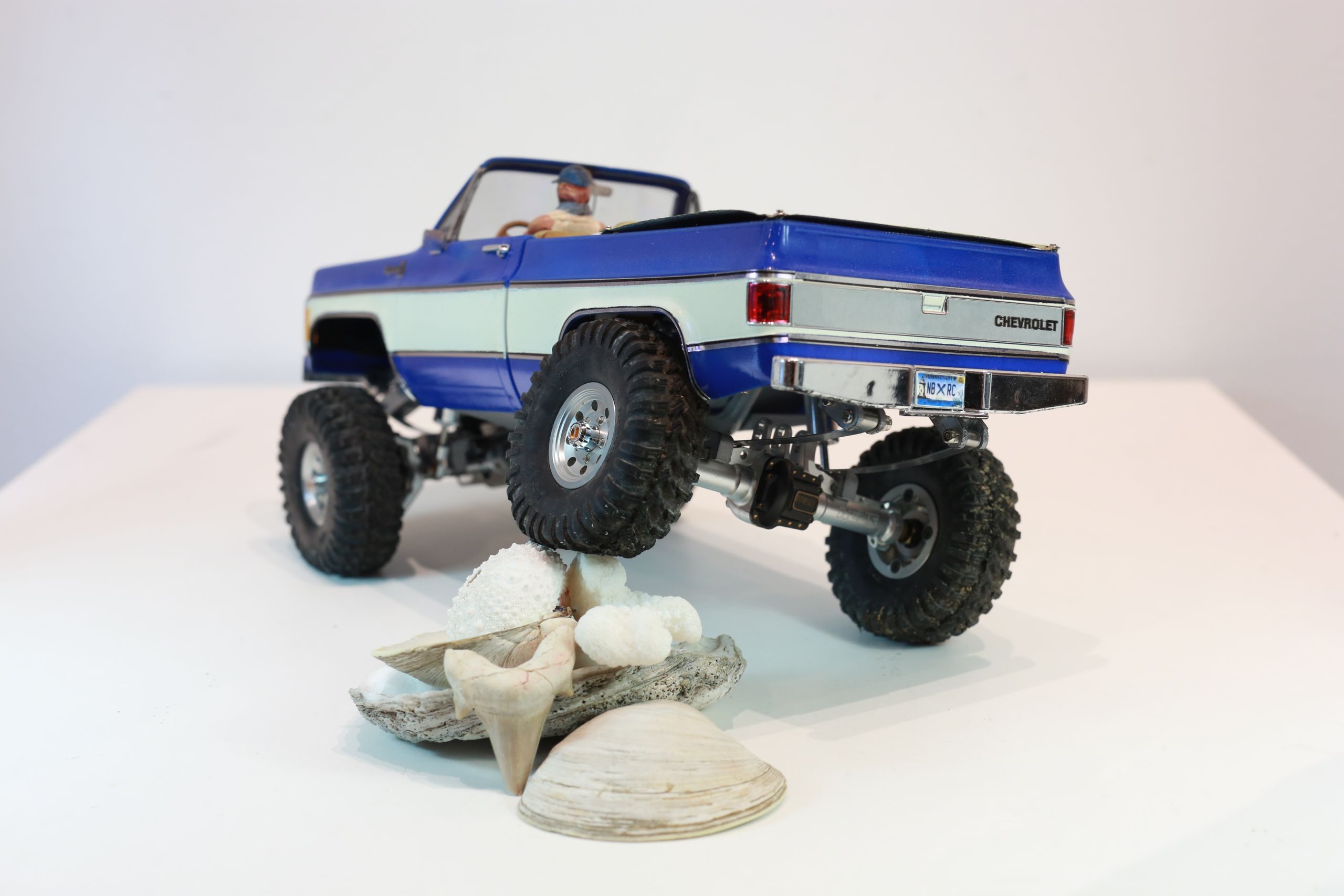 1/18 scale traxxas trx4m based custom rc build of a chevy k10 with micro leaf spring suspension system.