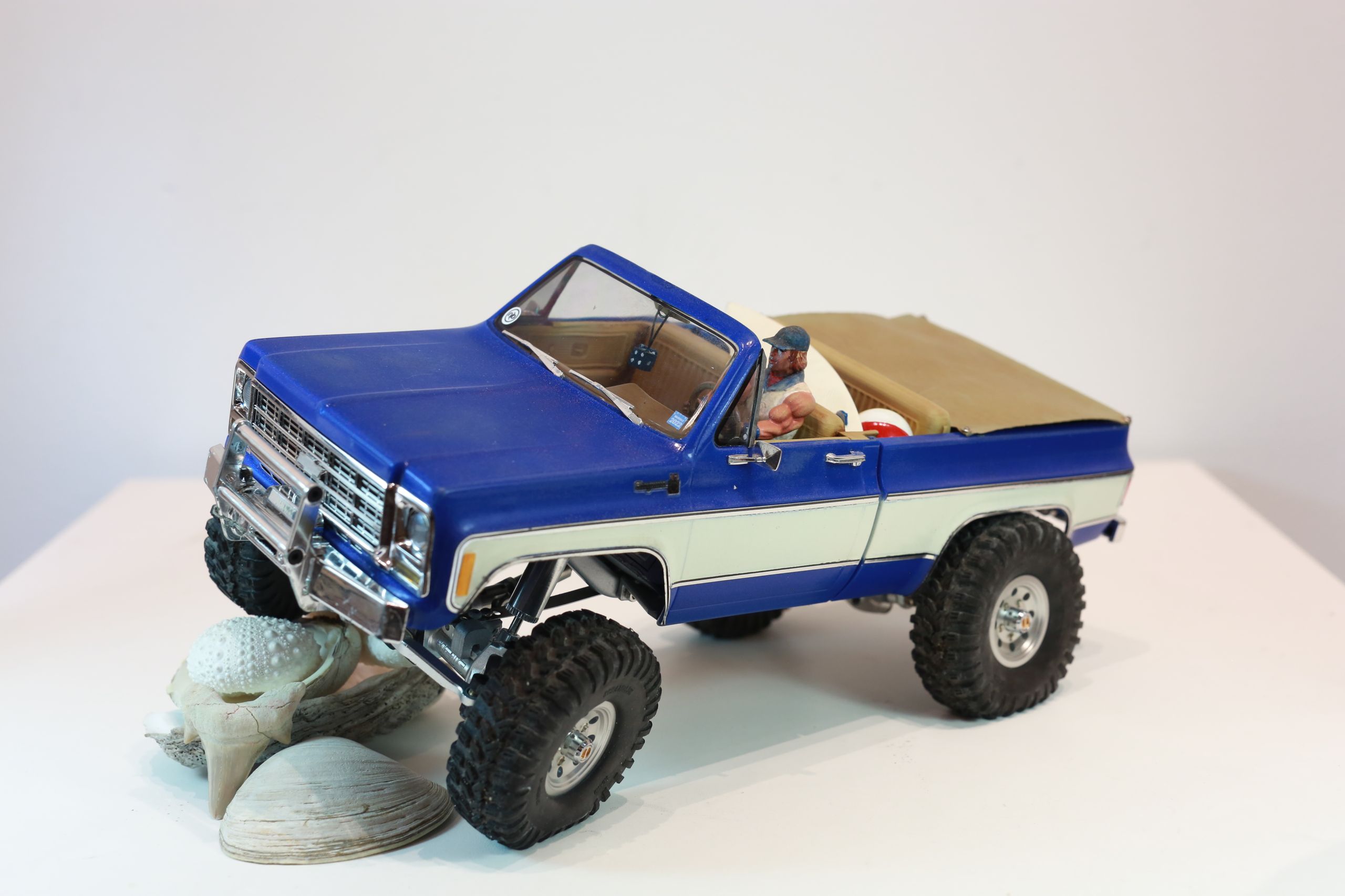1/18 scale traxxas trx4m based custom rc build of a chevy k10 with micro leaf spring suspension system.