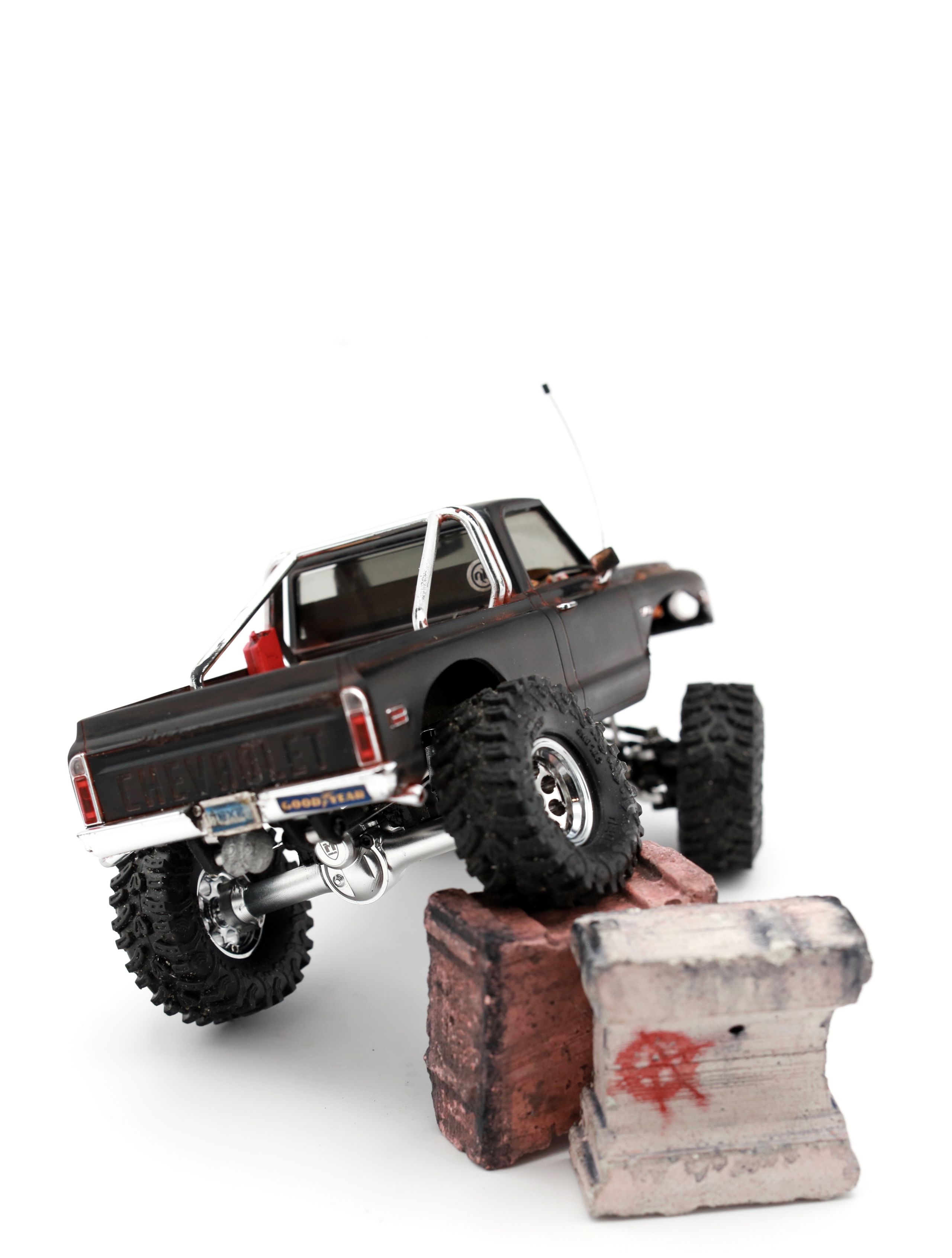 1/30 scale1/30 scale Chevy C10 beater RC truck with custom DIY rear leaf spring suspension system.