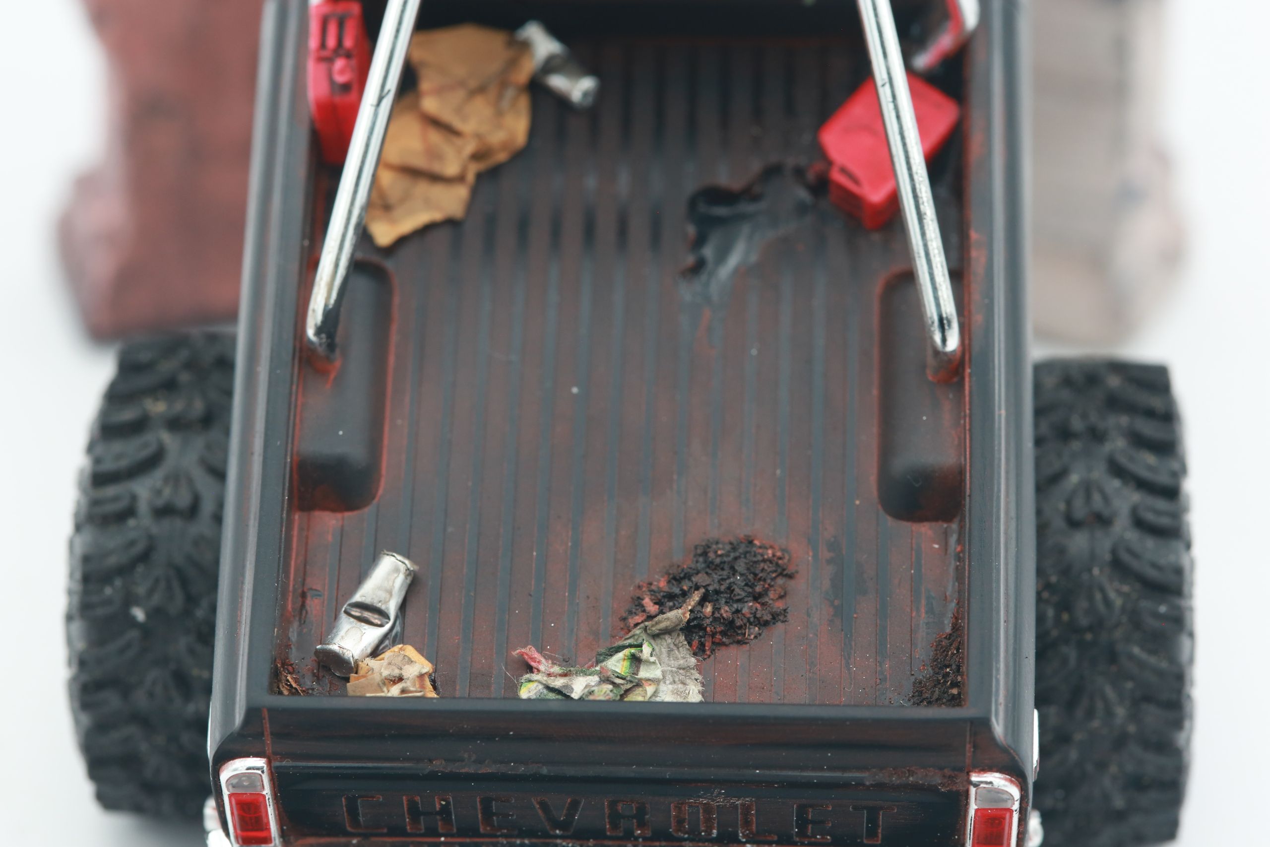 1/30 scale1/30 scale Chevy C10 beater RC truck with custom DIY rear leaf spring suspension system.