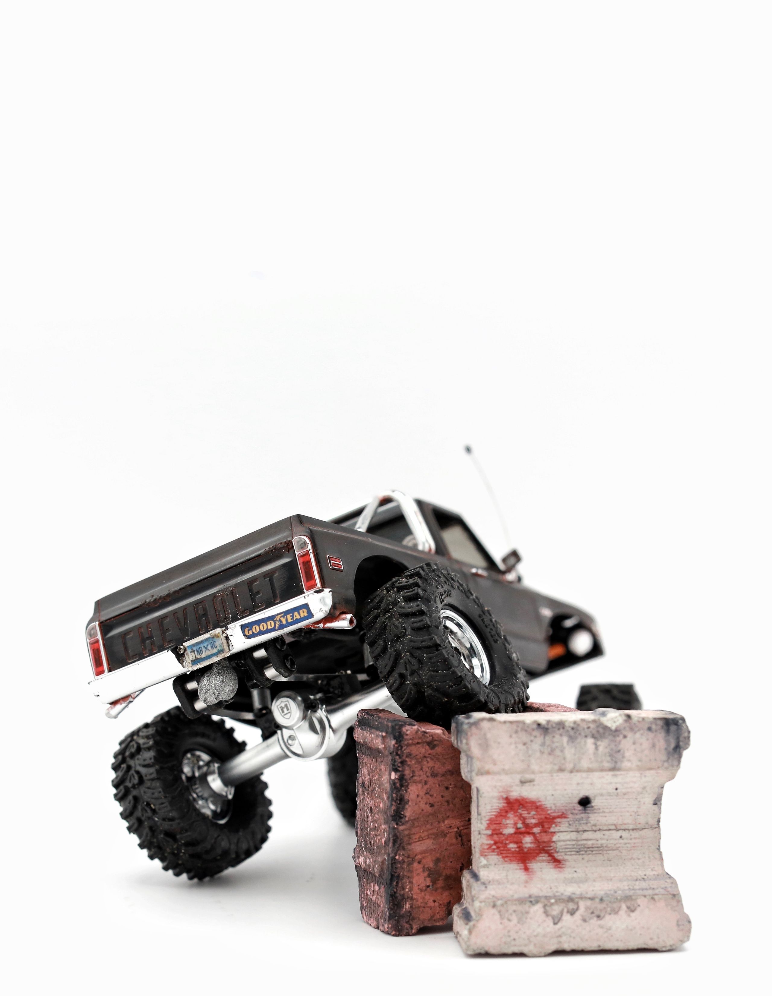 1/30 scale1/30 scale Chevy C10 beater RC truck with custom DIY rear leaf spring suspension system.