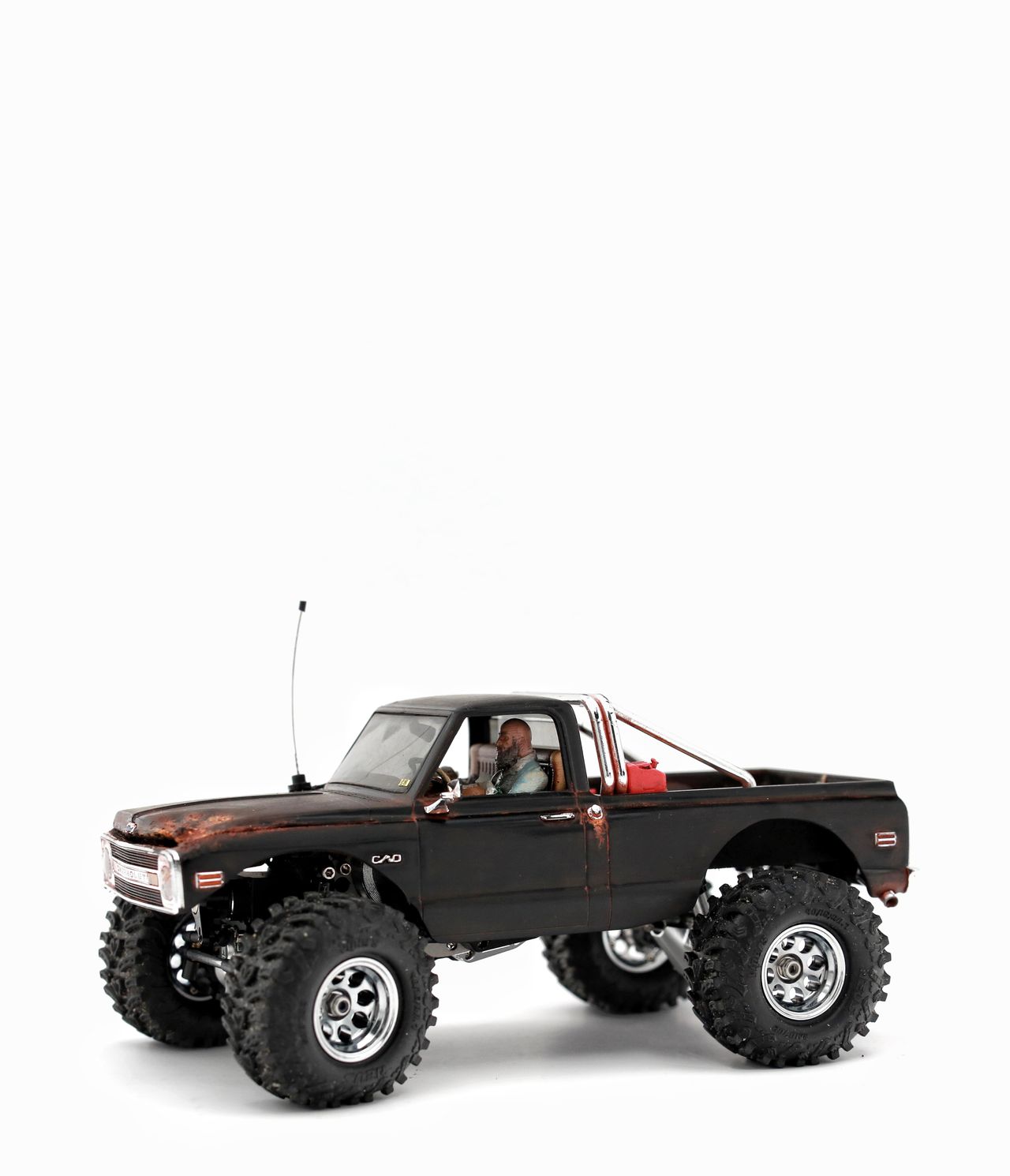 1/30 scale1/30 scale Chevy C10 beater RC truck with custom DIY rear leaf spring suspension system.