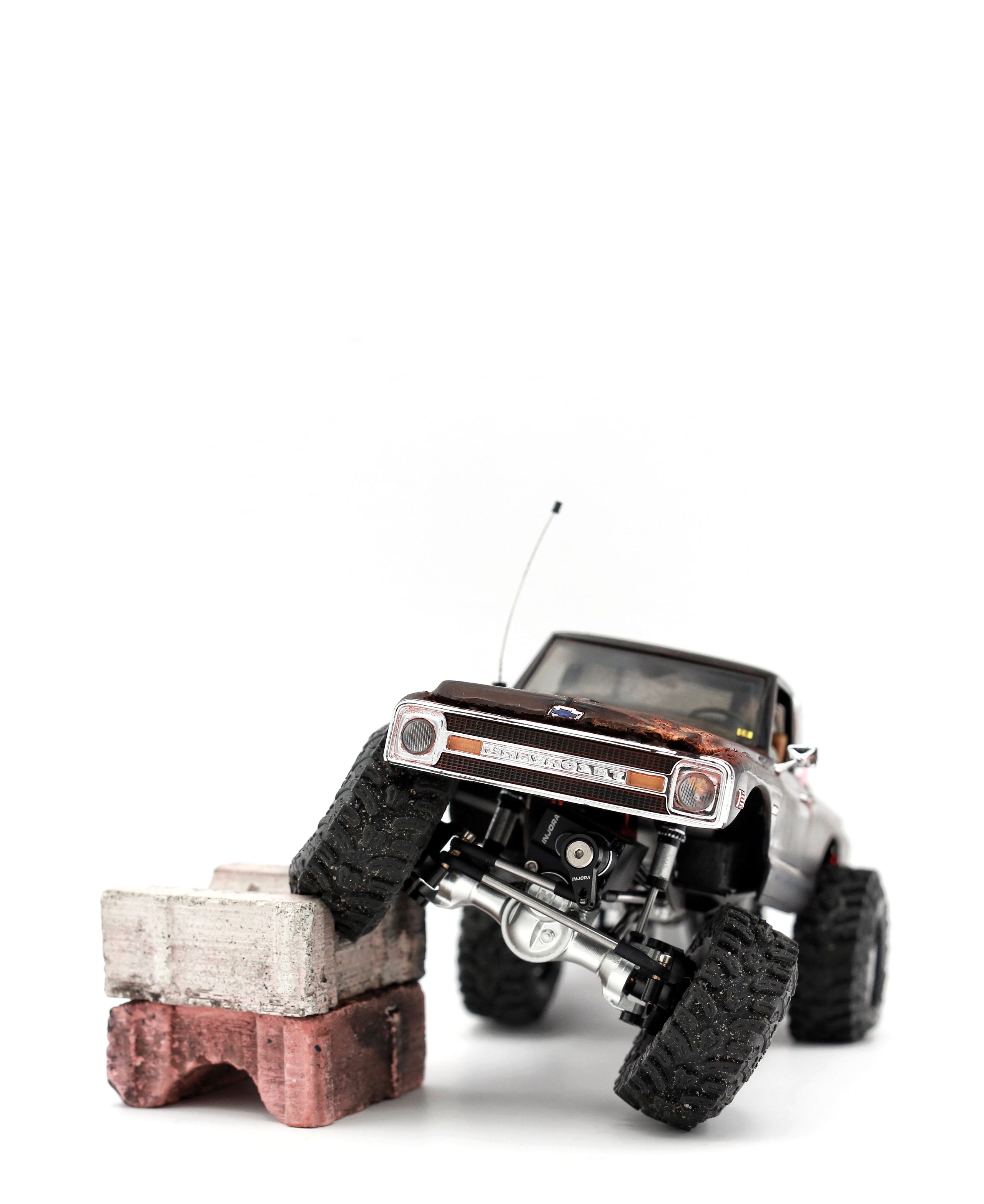 1/30 scale1/30 scale Chevy C10 beater RC truck with custom DIY rear leaf spring suspension system.