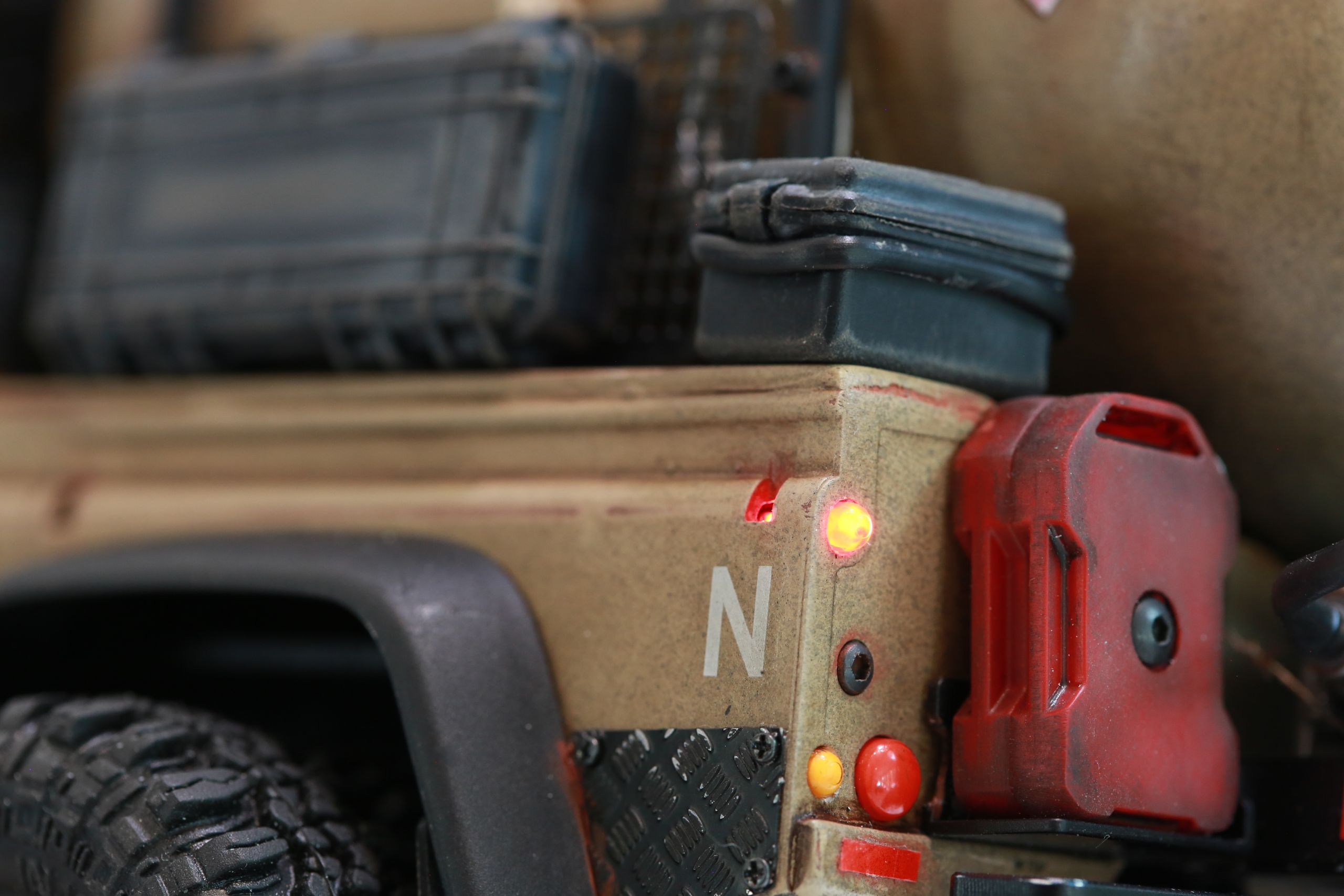 The Land Rover Defender Resource Recovery Vehicle (RRV) is an imagined 1/18 scale post-apocalyptic tanker truck that roams the industrial wasteland harvesting fuel from abandoned sites for transport back to the survivor encampment.