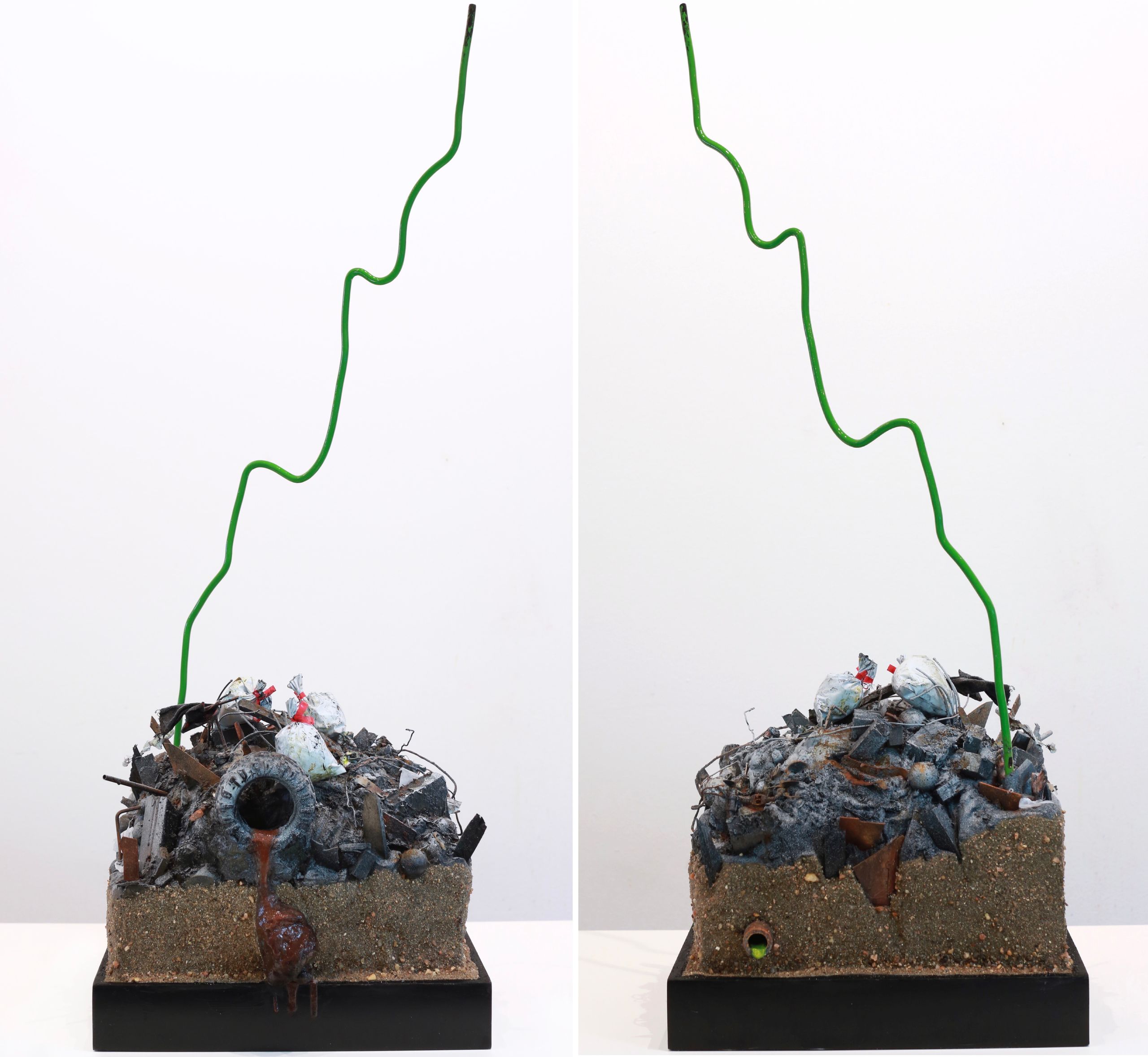 Sculpture made from Plastic, wood, foam, metal, wire, fabric, paint, paper, rubber, cardboard, CA glue, dirt, found objects with commentary on unsustainable economic, urban, and population growth on a finite planet, with a green stock market ticker rising above the wasteland symbolizing the piece's title, a popular stock market and cryptocurrency slogan