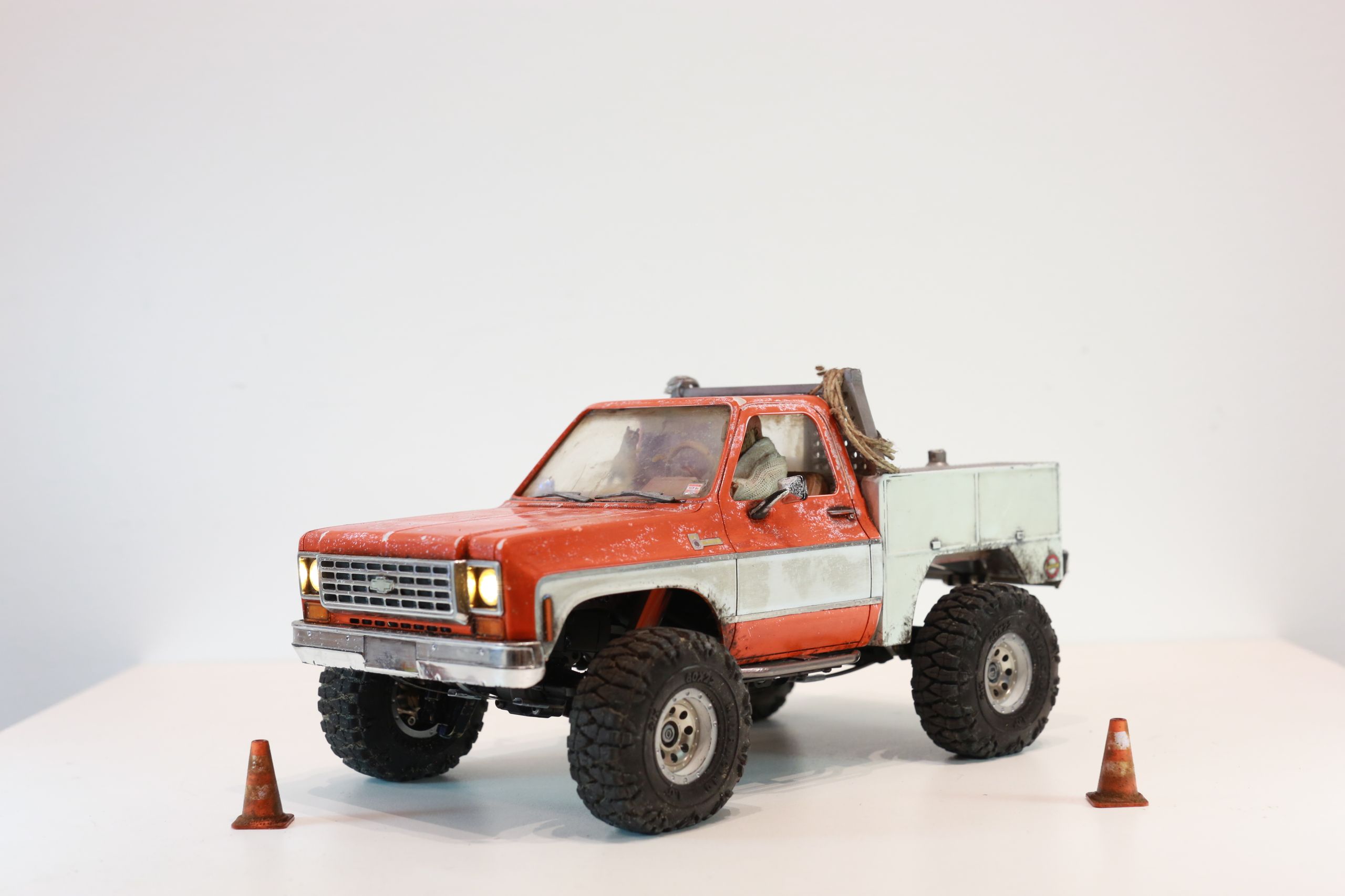 1/24 scale Chevy K5 cab only body with service truck bed filled with handmade tools, trash, old window mounted A/C unit made by austin texas artist nick baxter