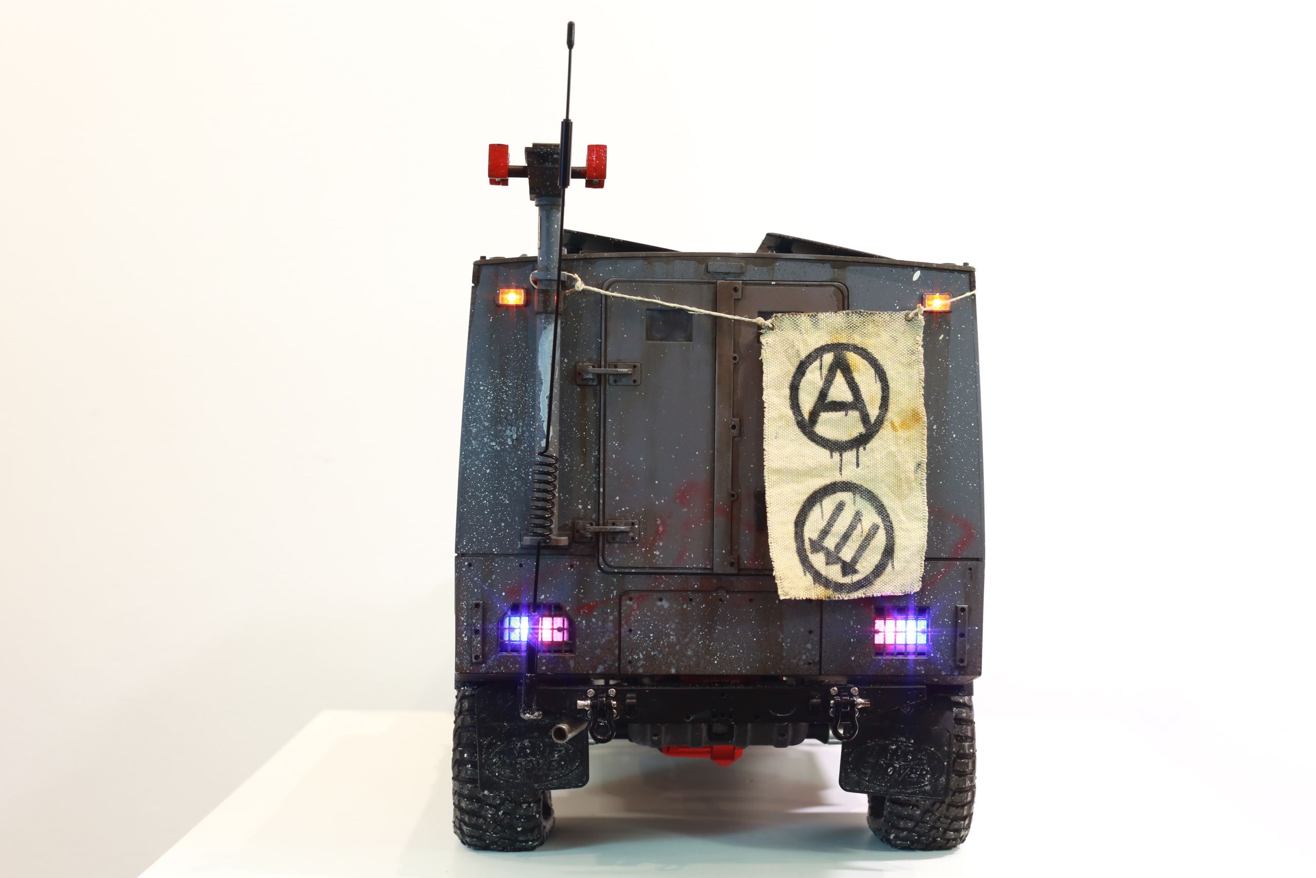 1/10 scale mercedes unimog rc body styled as a reclaimed police vehicle by artist nick baxter in austin texas