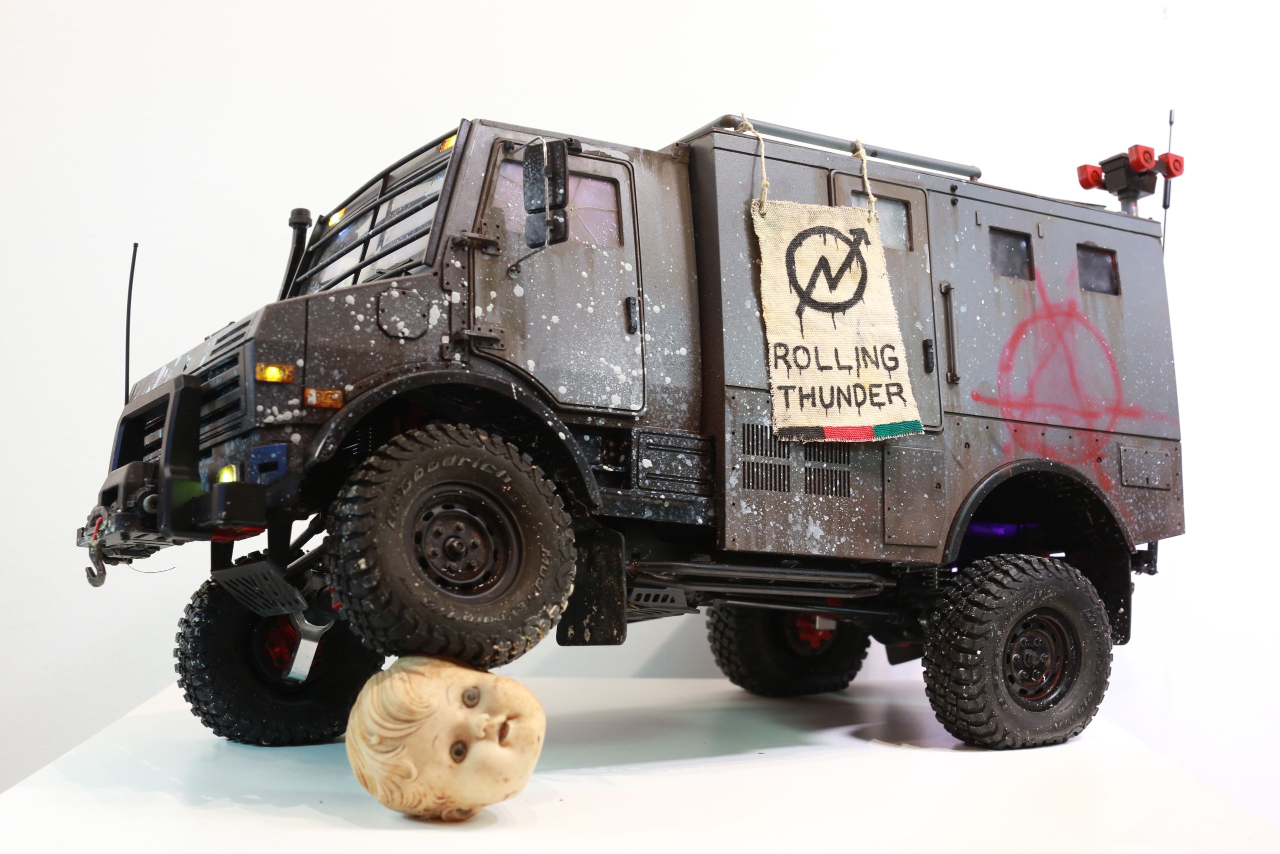 1/10 scale mercedes unimog rc body styled as a reclaimed police vehicle by artist nick baxter in austin texas
