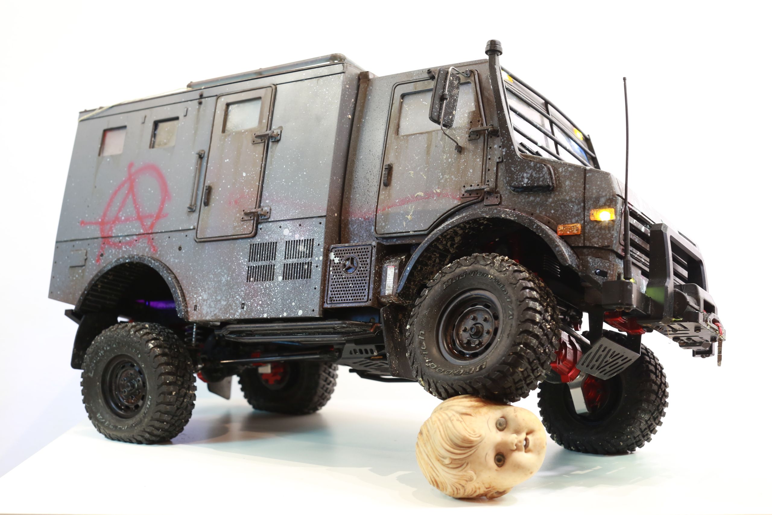 1/10 scale mercedes unimog rc body styled as a reclaimed police vehicle by artist nick baxter in austin texas