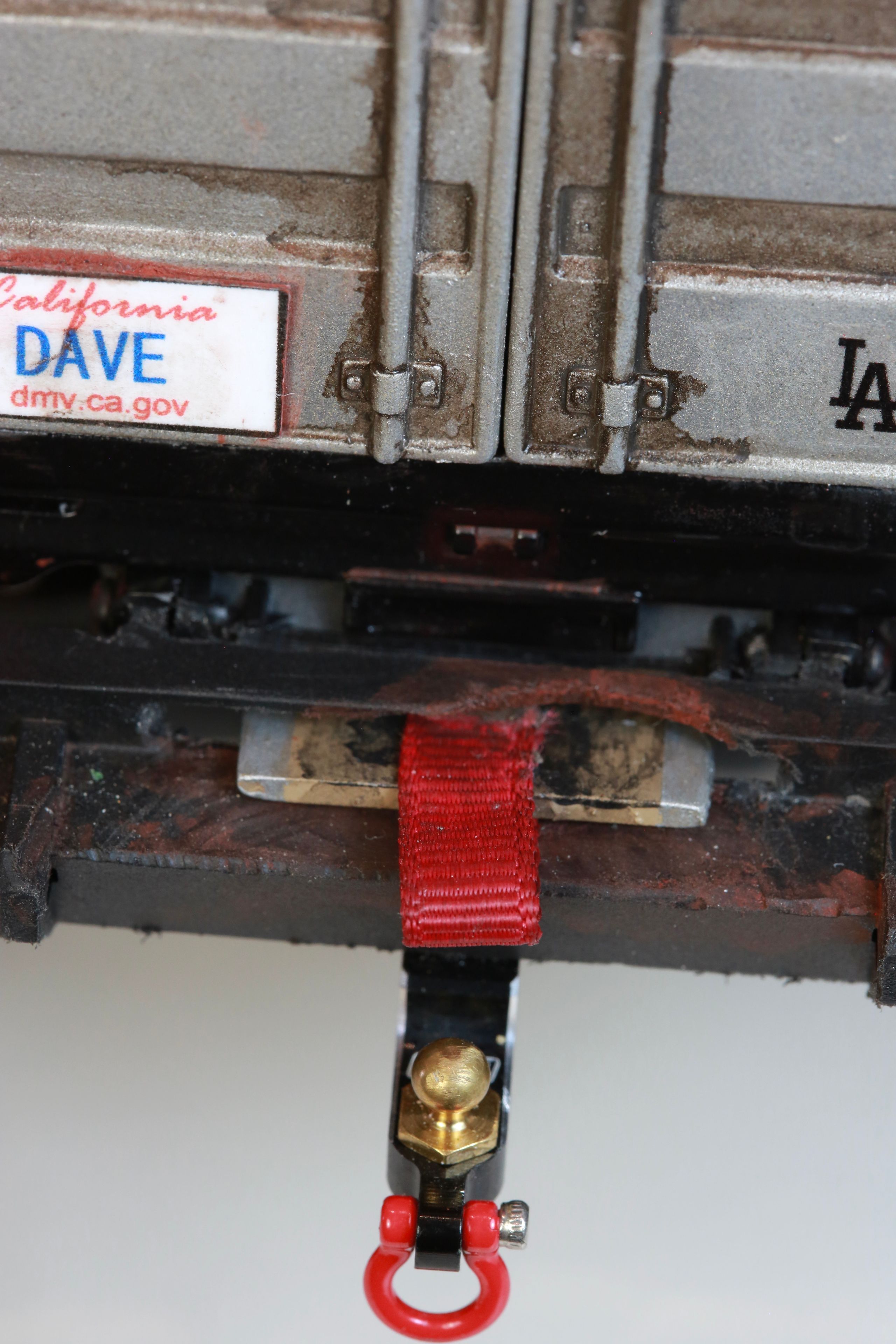 1/24 scale Kei truck body on a 1/18 scale RC chassis tribute by artist nick baxter to tattoo client and friend Dave who owns Austin Texas-based moving company Ogre Man Movers