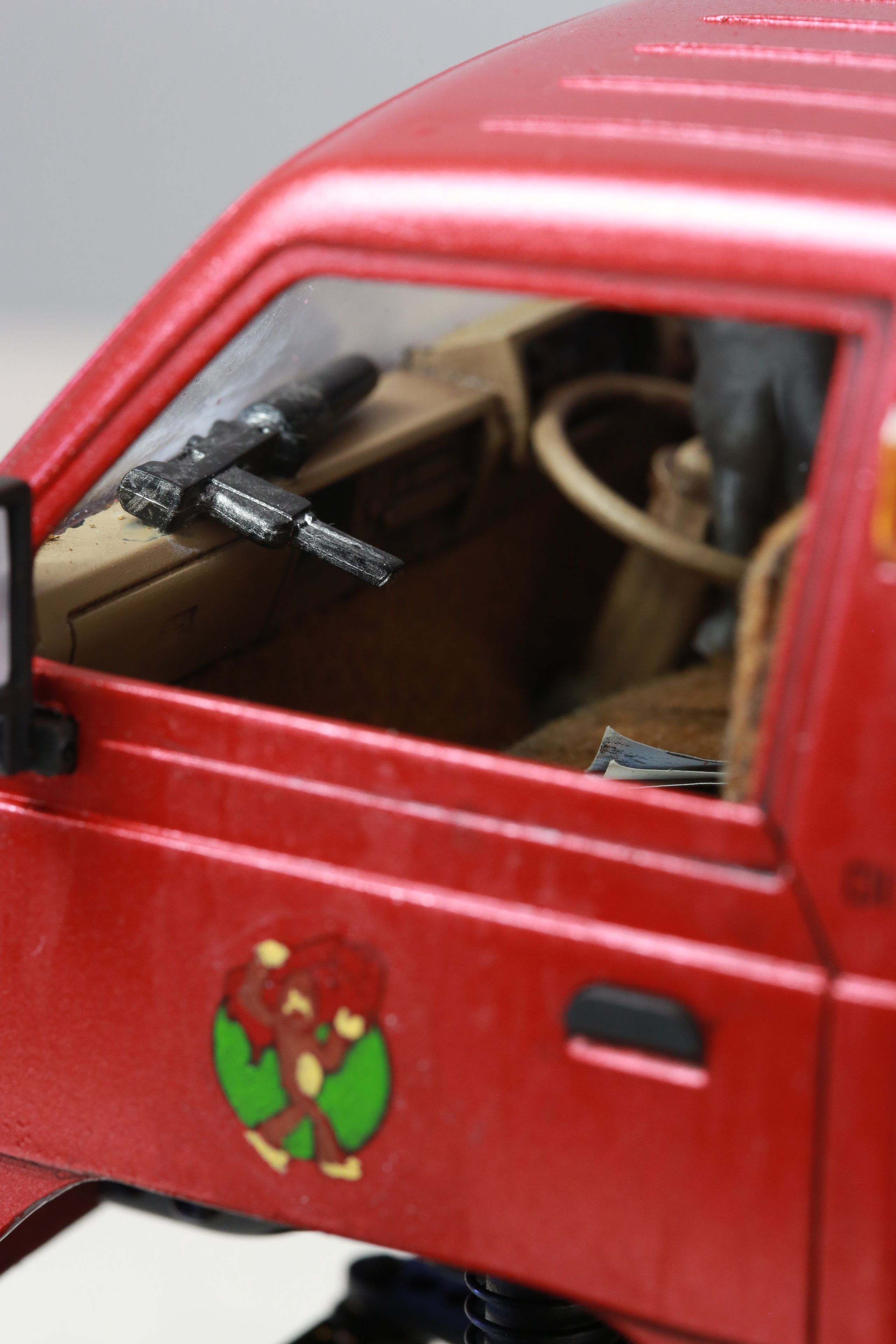 1/24 scale Kei truck body on a 1/18 scale RC chassis tribute by artist nick baxter to tattoo client and friend Dave who owns Austin Texas-based moving company Ogre Man Movers