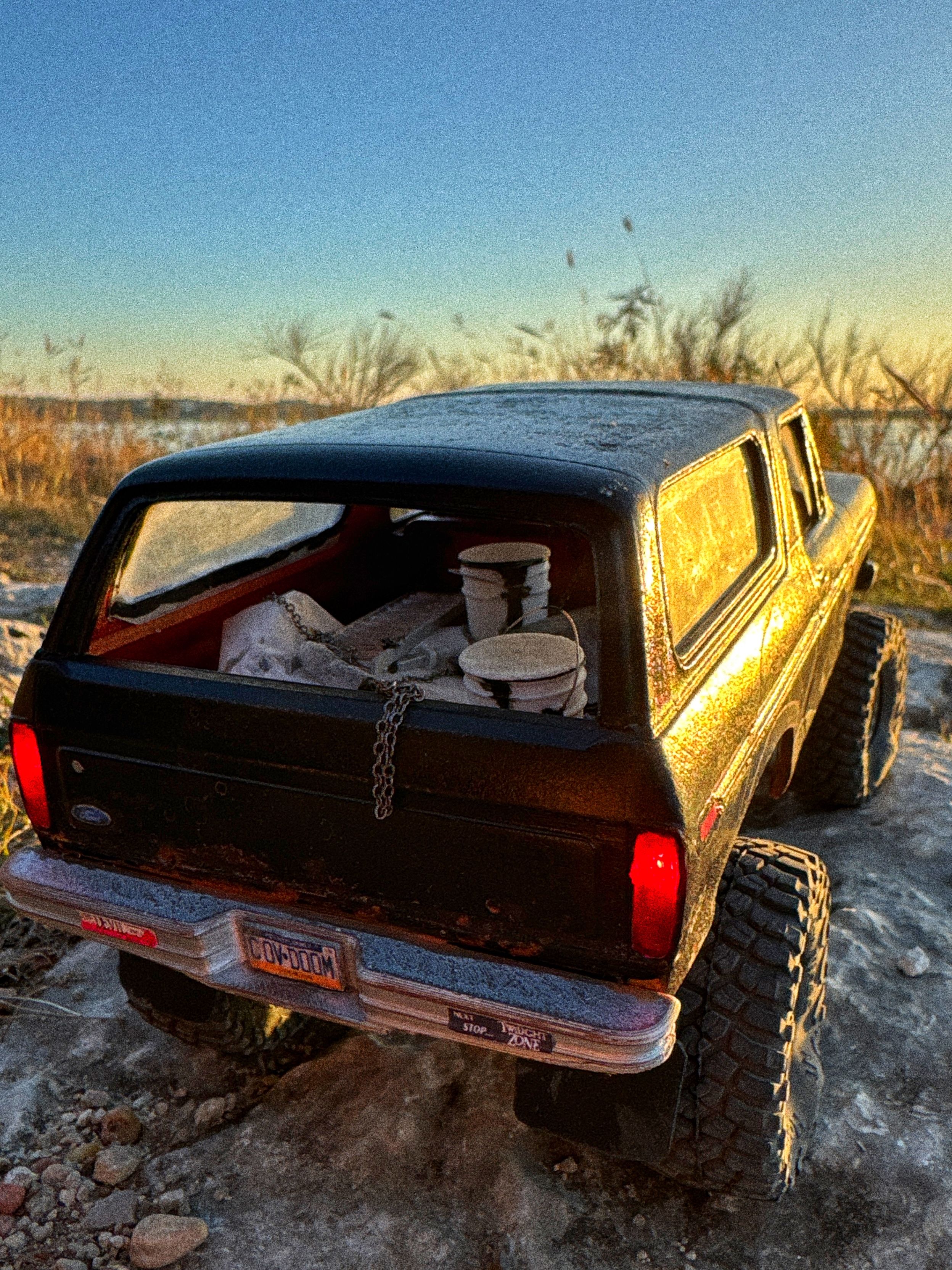 1970s Ford Bronco RC build with female driver and mural painting supplies in the back and her beloved cat by artist nick baxter in austin texas.
