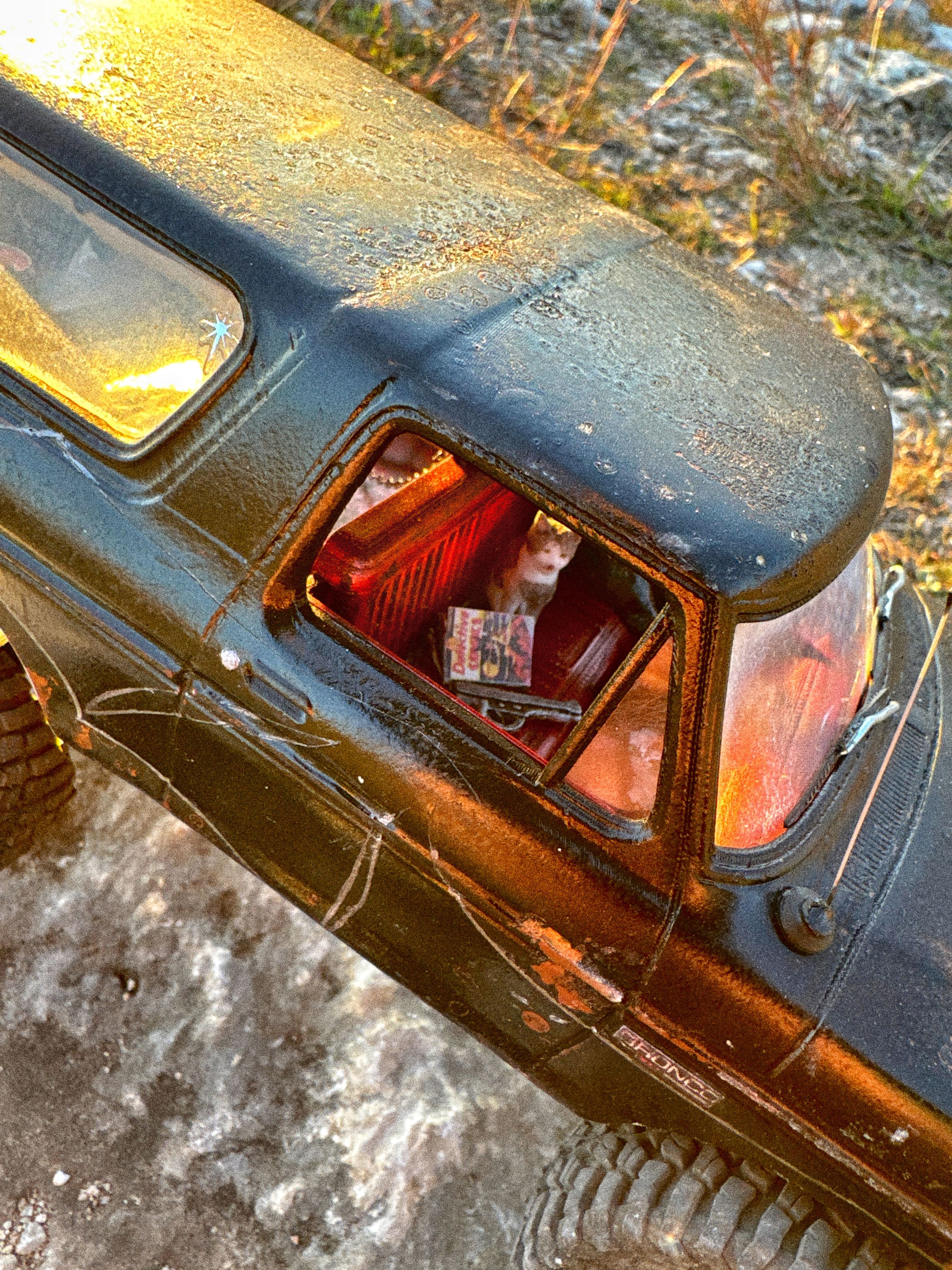1970s Ford Bronco RC build with female driver and mural painting supplies in the back and her beloved cat by artist nick baxter in austin texas.