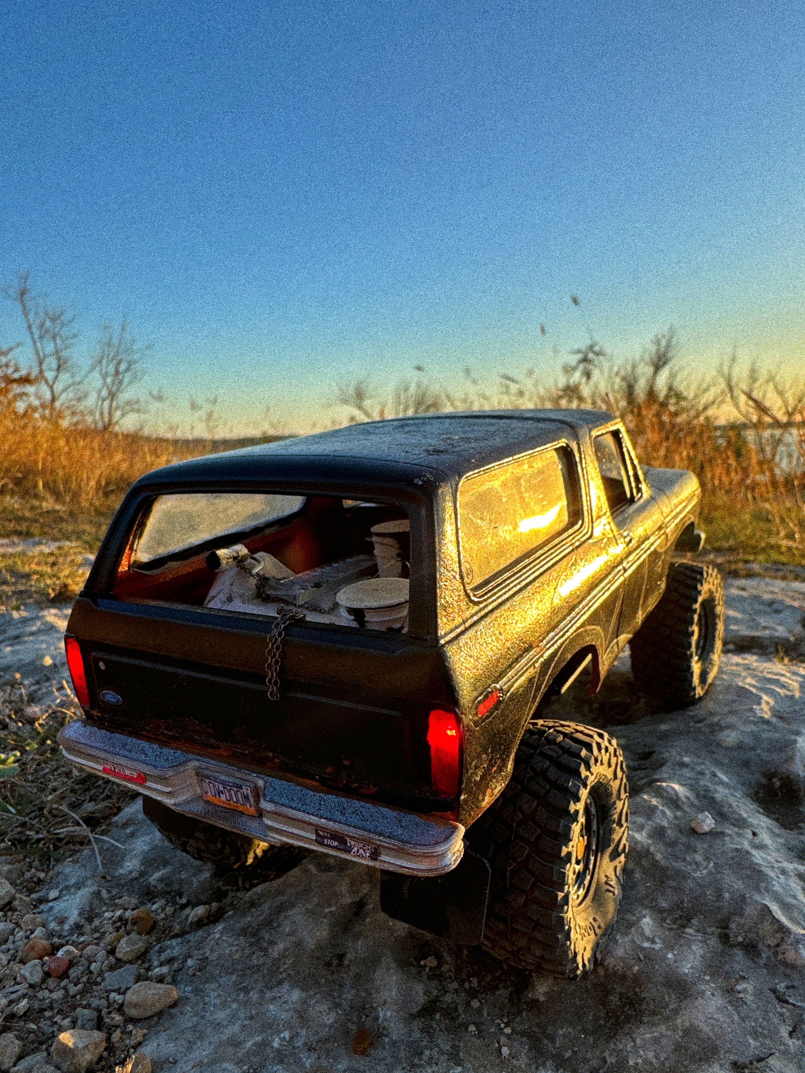 1970s Ford Bronco RC build with female driver and mural painting supplies in the back and her beloved cat by artist nick baxter in austin texas.