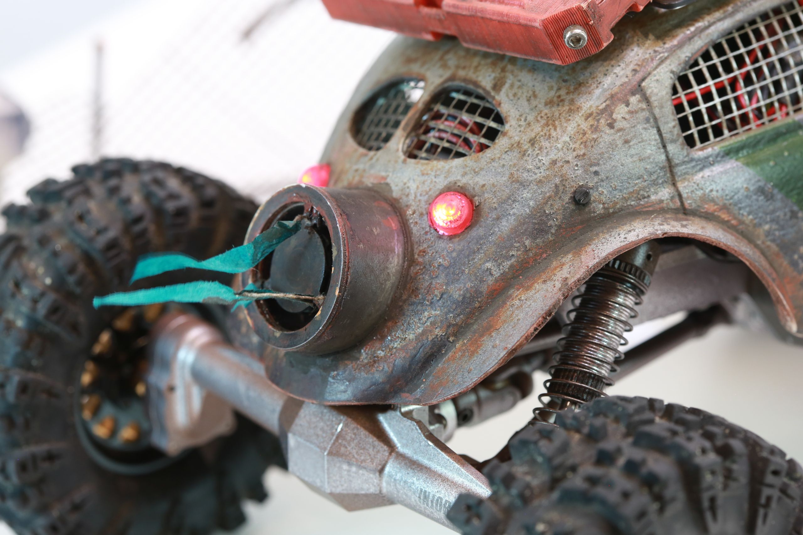 1/18 scale post-apocalyptic old desert Volkswagen Beetle fast transport vehicle by artist nick baxter in austin texas featuring working blower fan with tissue paper streamers