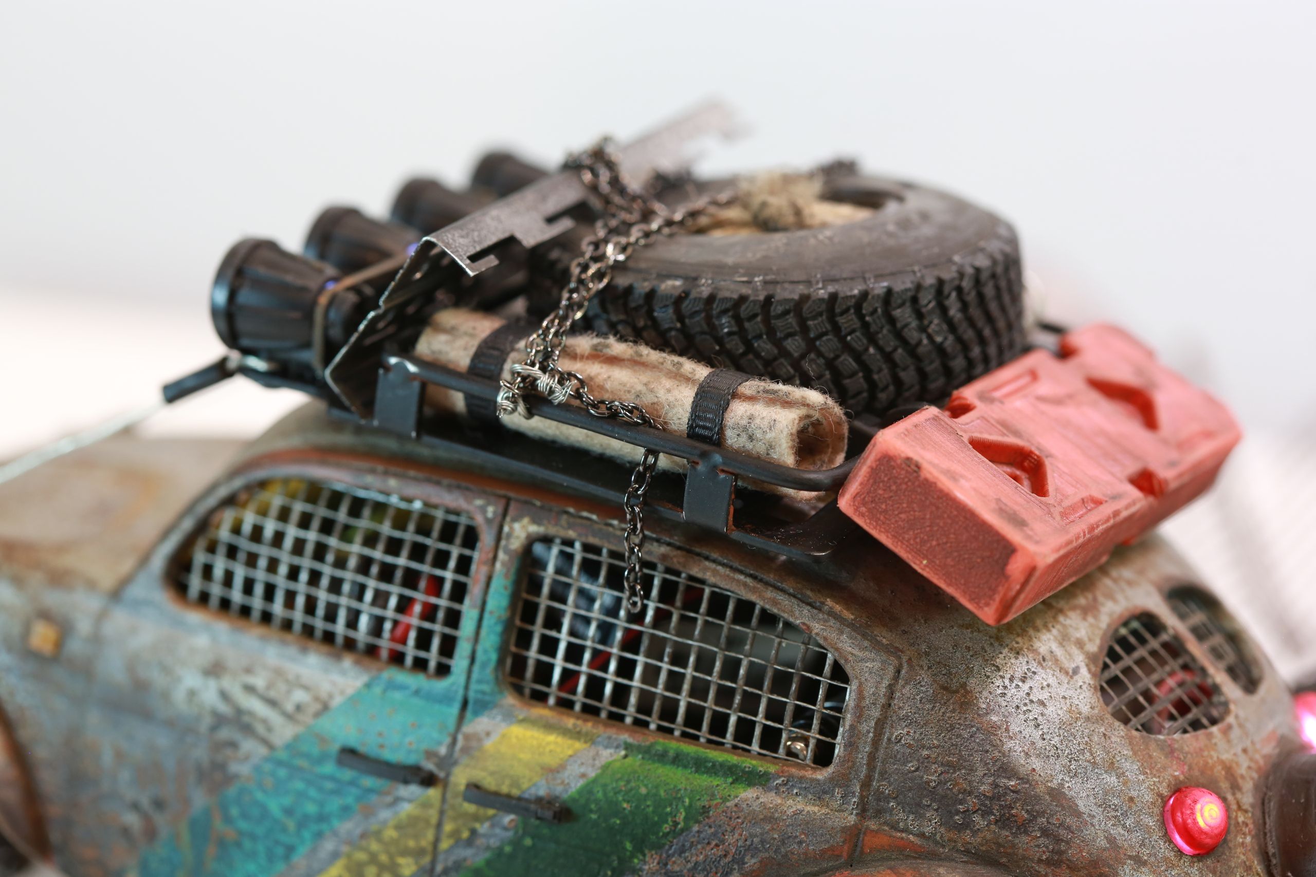 1/18 scale post-apocalyptic old desert Volkswagen Beetle fast transport vehicle by artist nick baxter in austin texas featuring working blower fan with tissue paper streamers