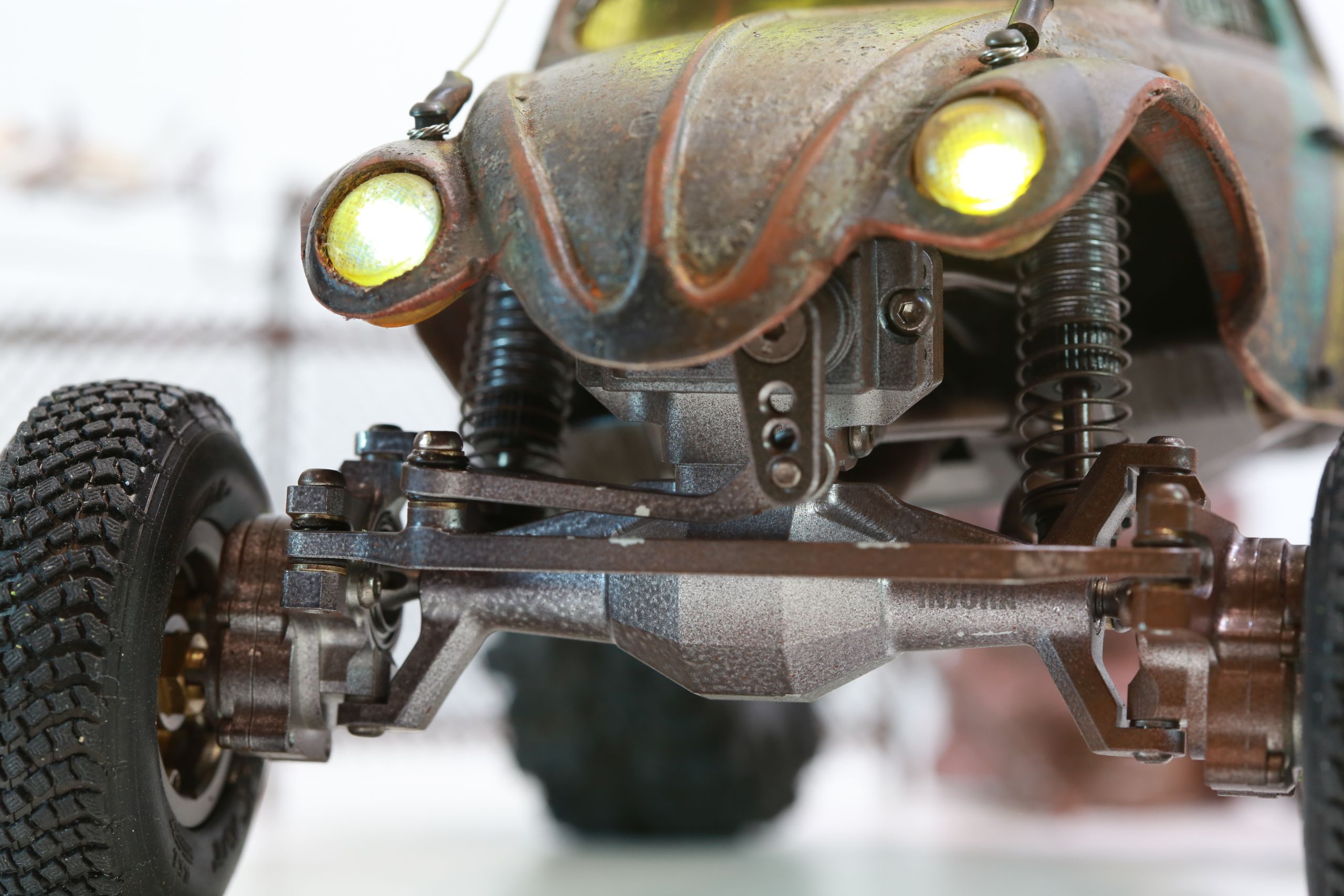 1/18 scale post-apocalyptic old desert Volkswagen Beetle fast transport vehicle by artist nick baxter in austin texas featuring working blower fan with tissue paper streamers