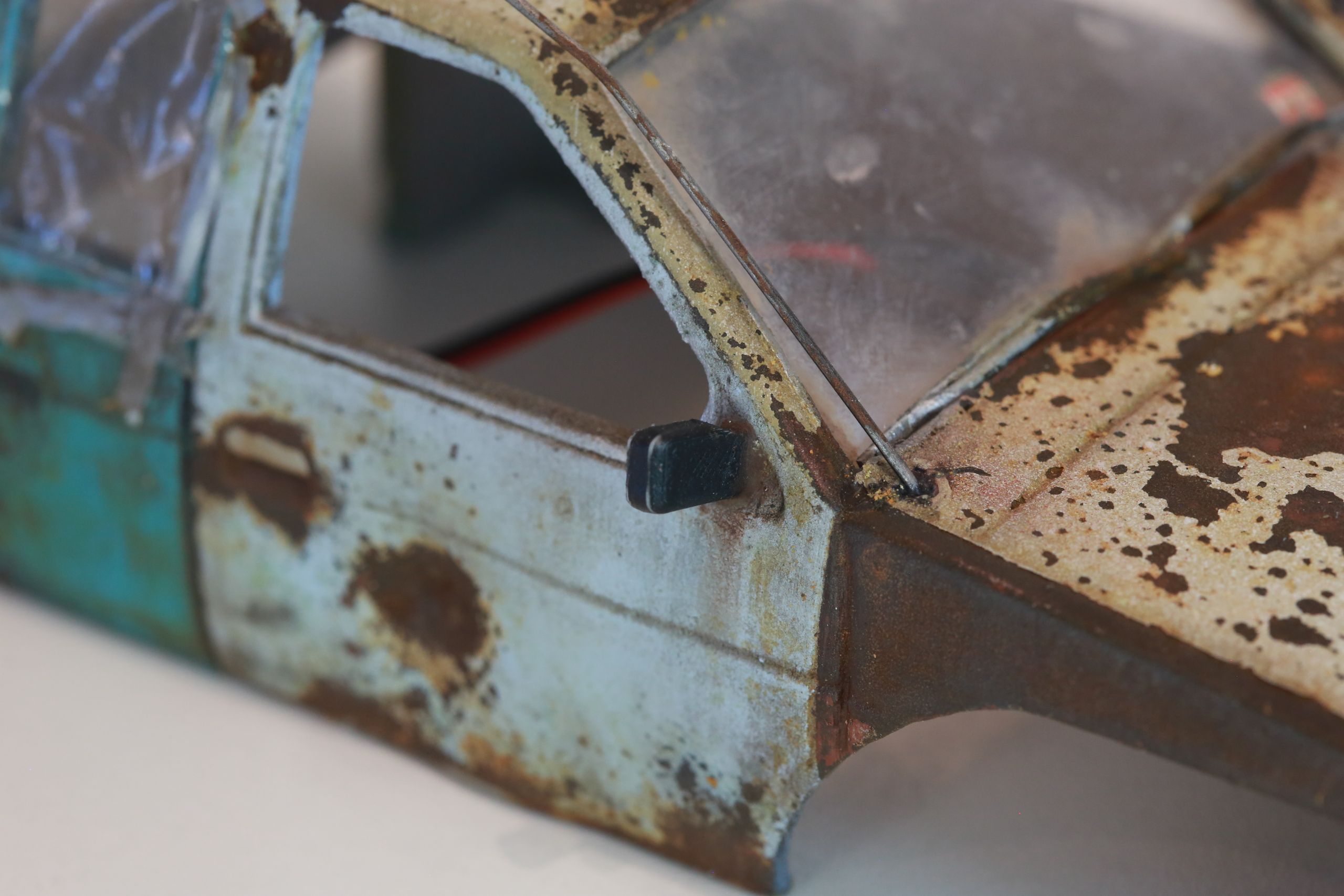 Old junkyard Nissan 1/24 scale 3d printed pickup body for scx24 RC truck with real rust patina, dents, duct tape windows, and custom bumpers.