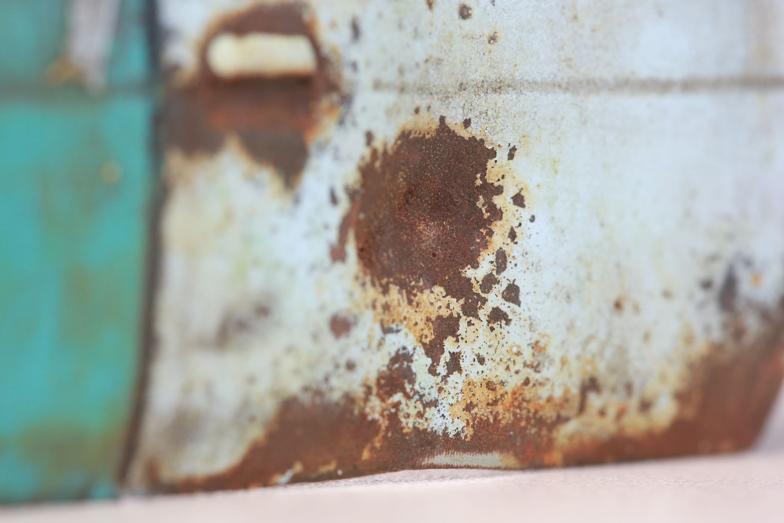 Old junkyard Nissan 1/24 scale 3d printed pickup body for scx24 RC truck with real rust patina, dents, duct tape windows, and custom bumpers.