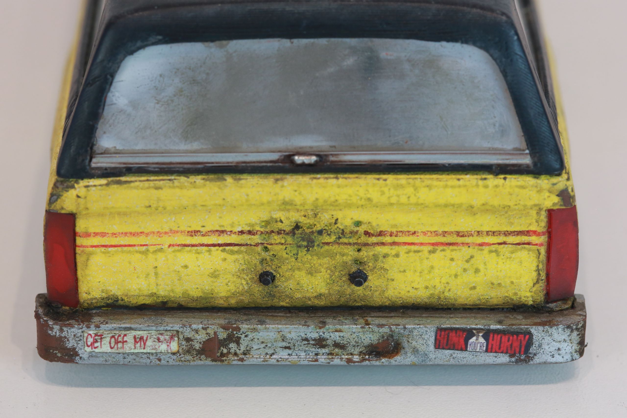 Old junkyard Nissan 1/24 scale 3d printed pickup body for scx24 RC truck with real rust patina, dents, duct tape windows, and custom bumpers.