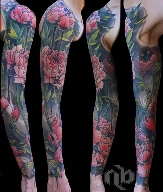 full arm sleeve tattoo coverup of laser-lightened tattoos, pairing contrasting symbolic opposites of delicate peonies with dripping blood, and a black pearl on the inner bicep.