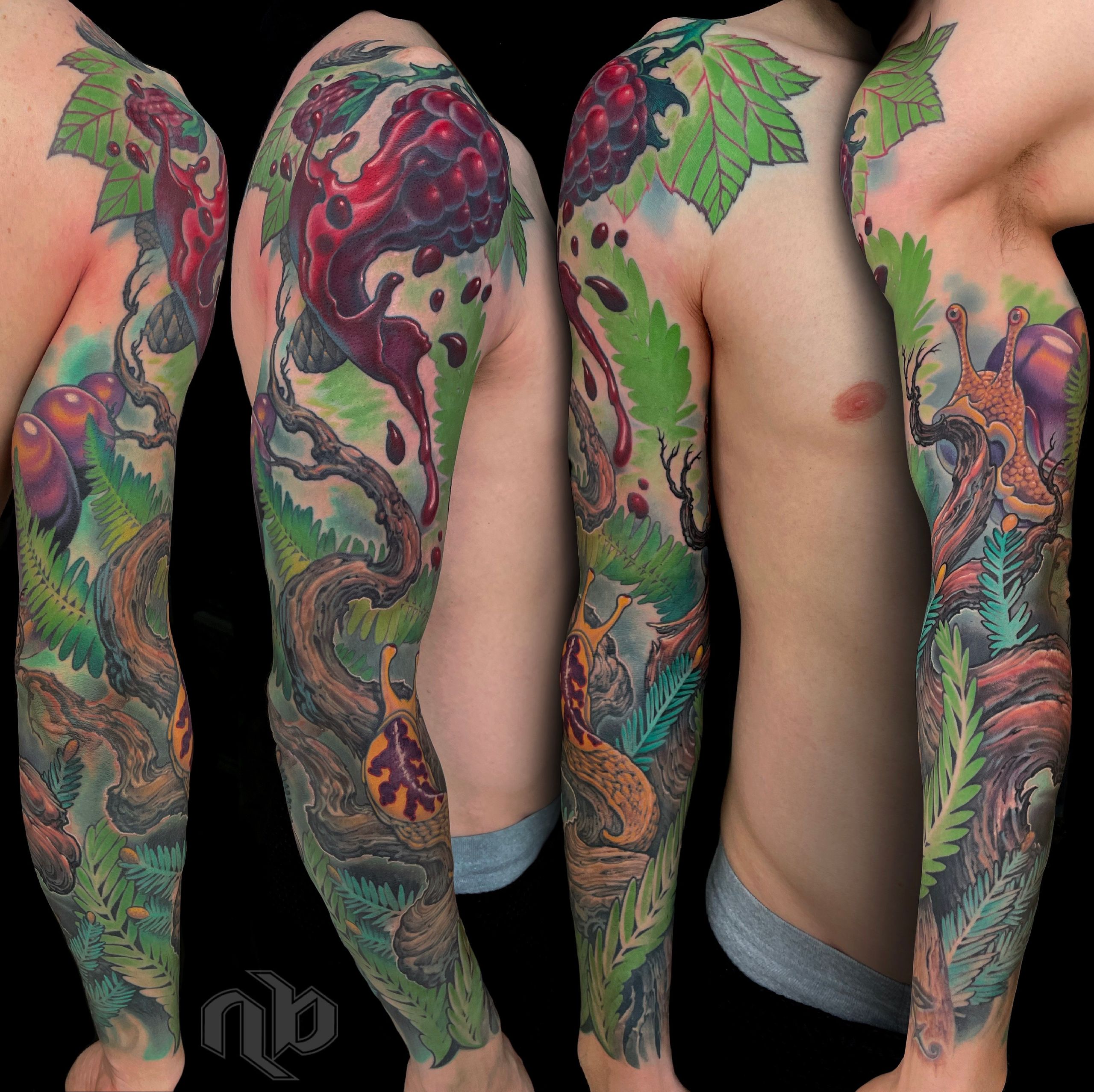 color tattoo of twisted tree, snail, banana slug, and berries in a landscape tribute to big sur california by nick baxter in austin texas
