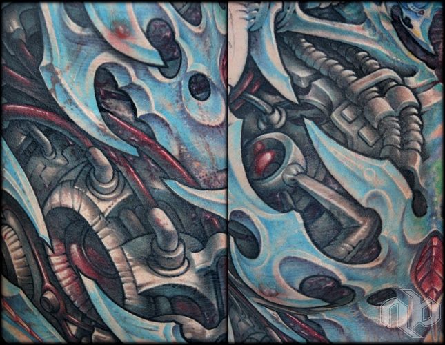 color biomechanical blades and machinery rib tattoo by nick baxter in austin texas