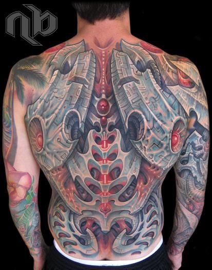 color biomechanical blades backpiece by nick baxter in austin texas