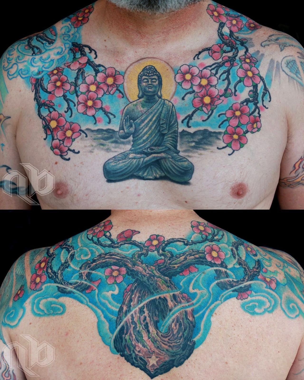 Colorful chest and upper back wraparound tattoo of a seated buddha statue surrounded by charry blossoms on branches which grow from an anatomically shaped human heart tree trunk with blue swirling clouds background.