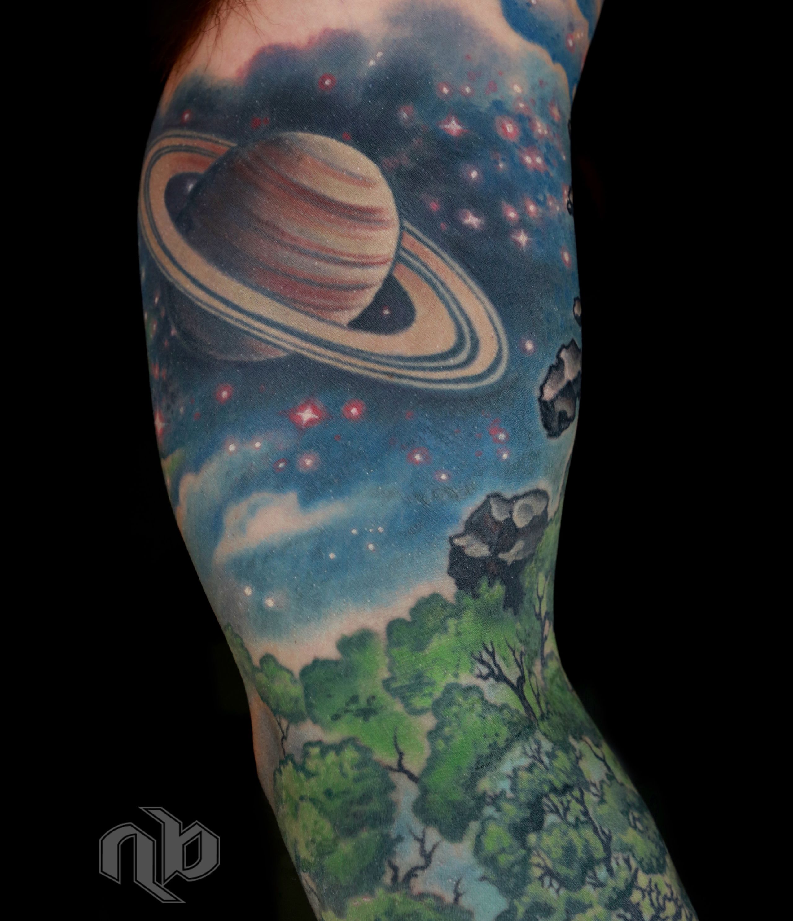 Illustrative color outer space and nature science tattoo by nick Baxter in Austin Texas