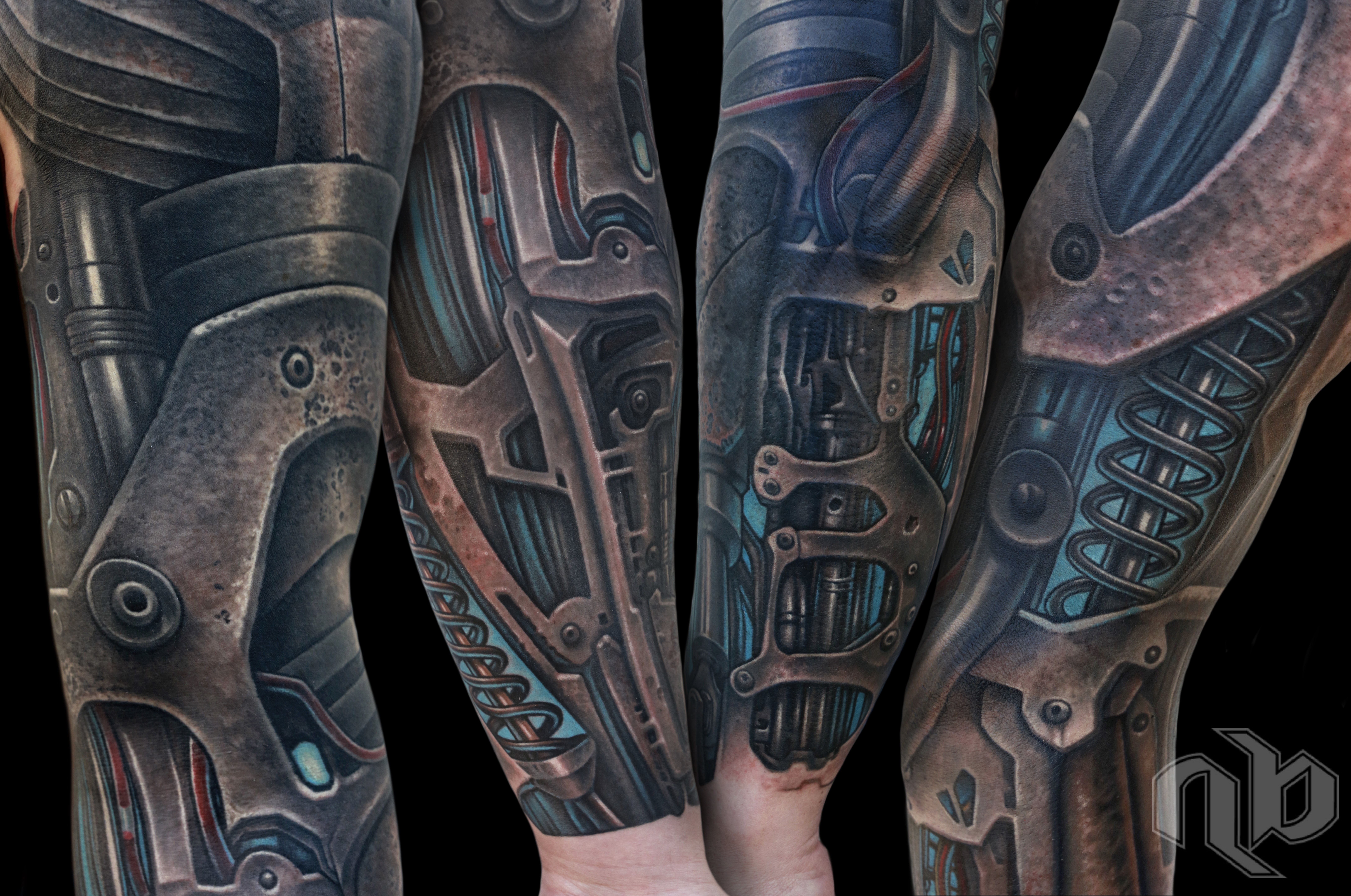 corroded and weathered patina metallic robot mech armor sleeve with springs, pistons and glowing wires and tubes by nick baxter in austin texas