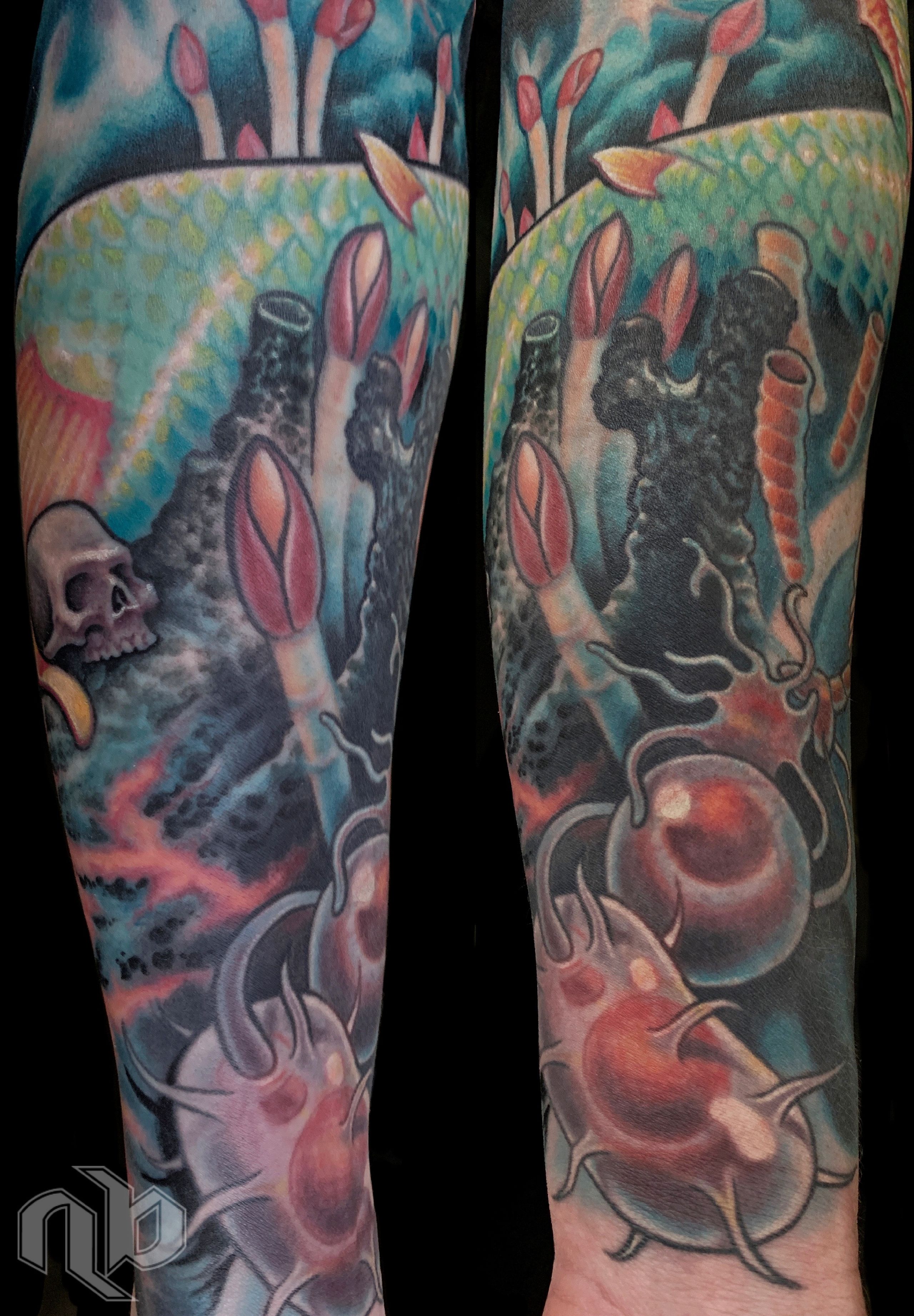 Two close views of a large arm tattoo featuring fish, a skull, dark amoeba organisms, and coral shapes in teal, pink, and orange.