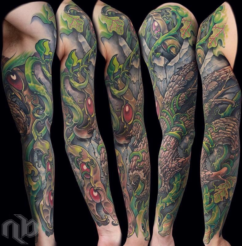 color bio-organic full arm sleeve of large seed pods and tree bark with vines and rock textures by nick baxter in austin texas