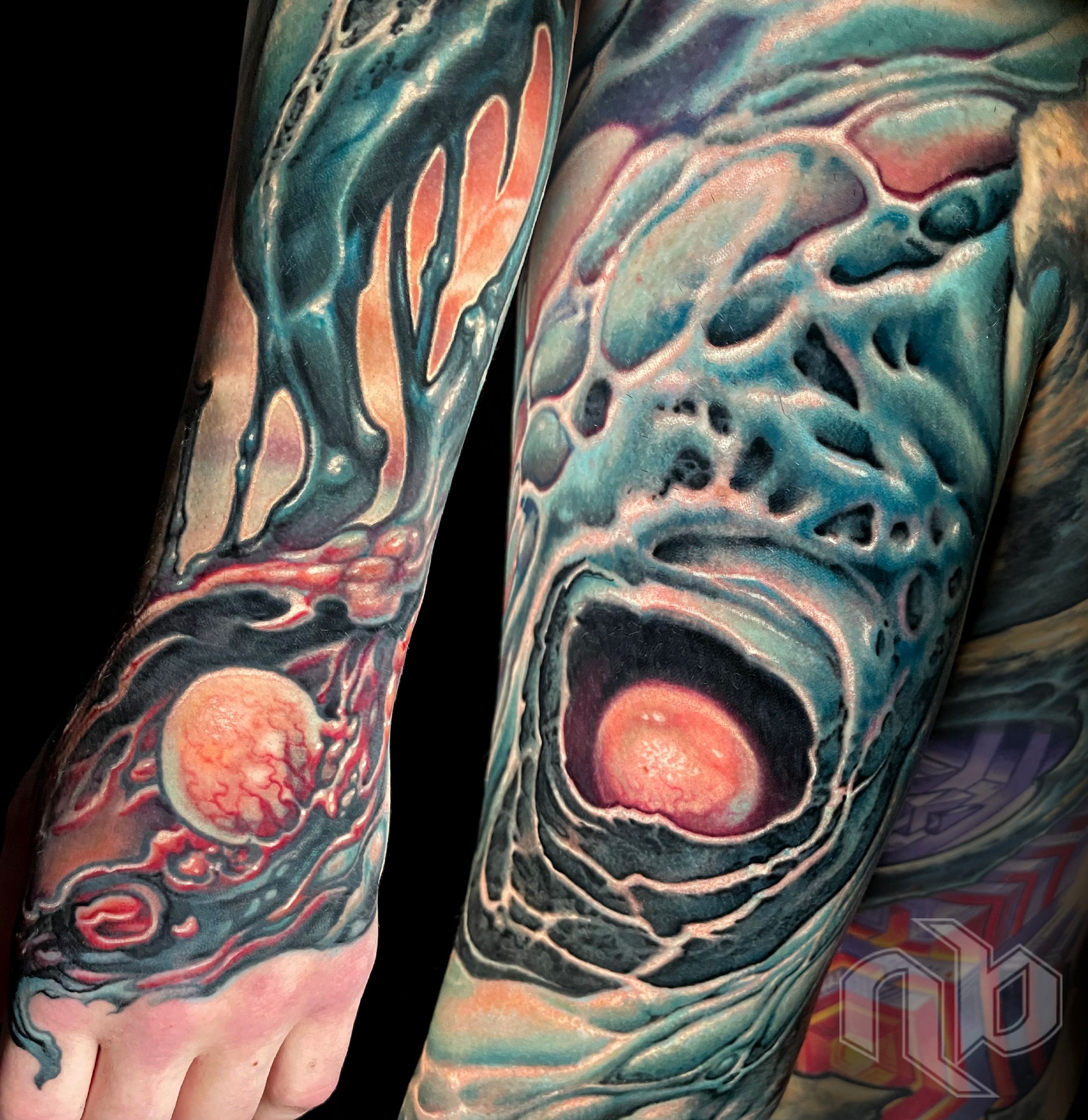dripping oily sludgy color bio organic tattoo by Nick Baxter in Austin Texas