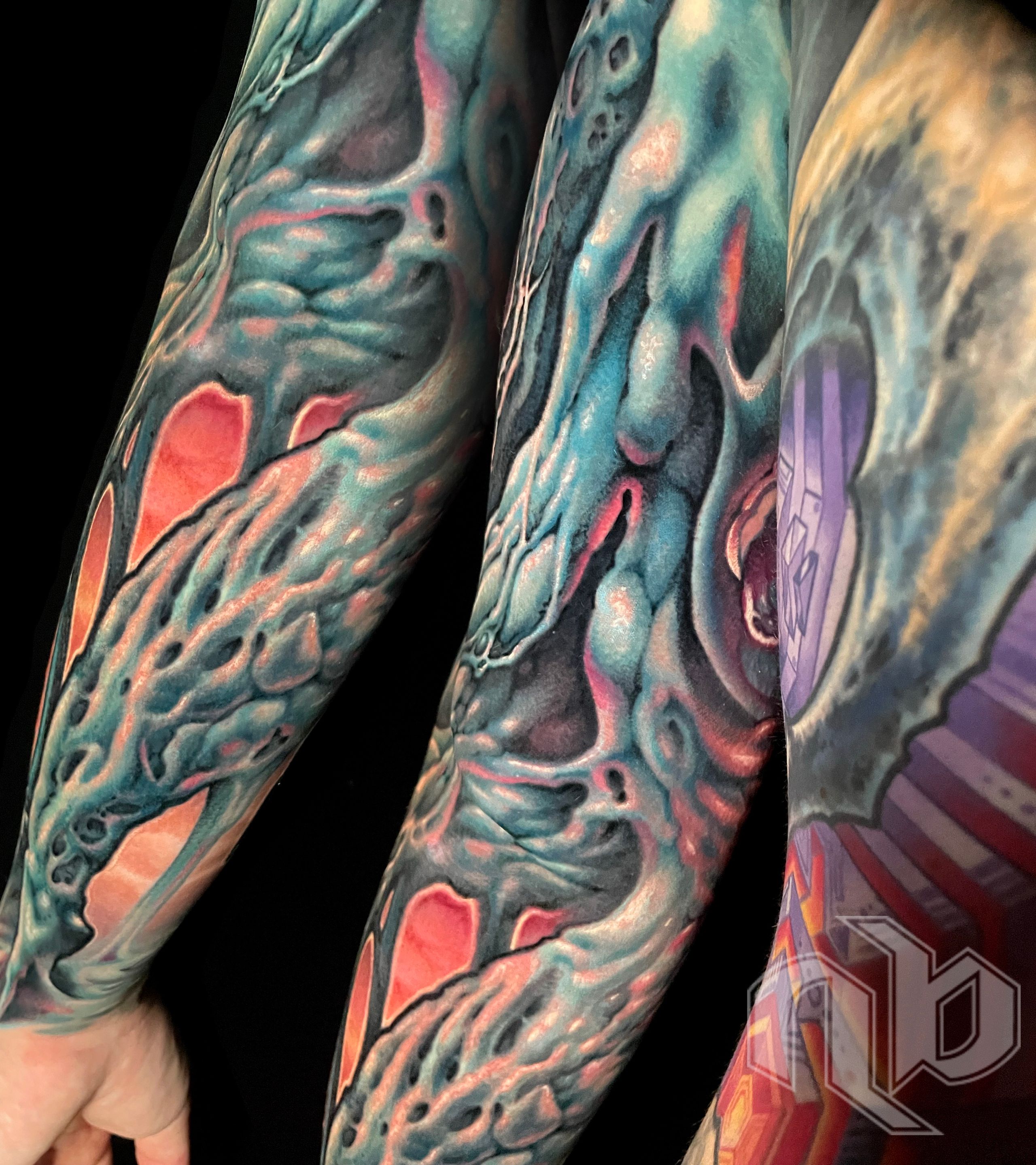dripping oily sludgy color bio organic tattoo by Nick Baxter in Austin Texas