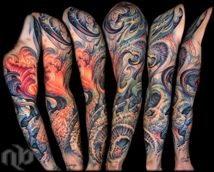Six views of a large arm tattoo show flowing bio-organic forms in vivid orange, blue, green, and black against a black background.
