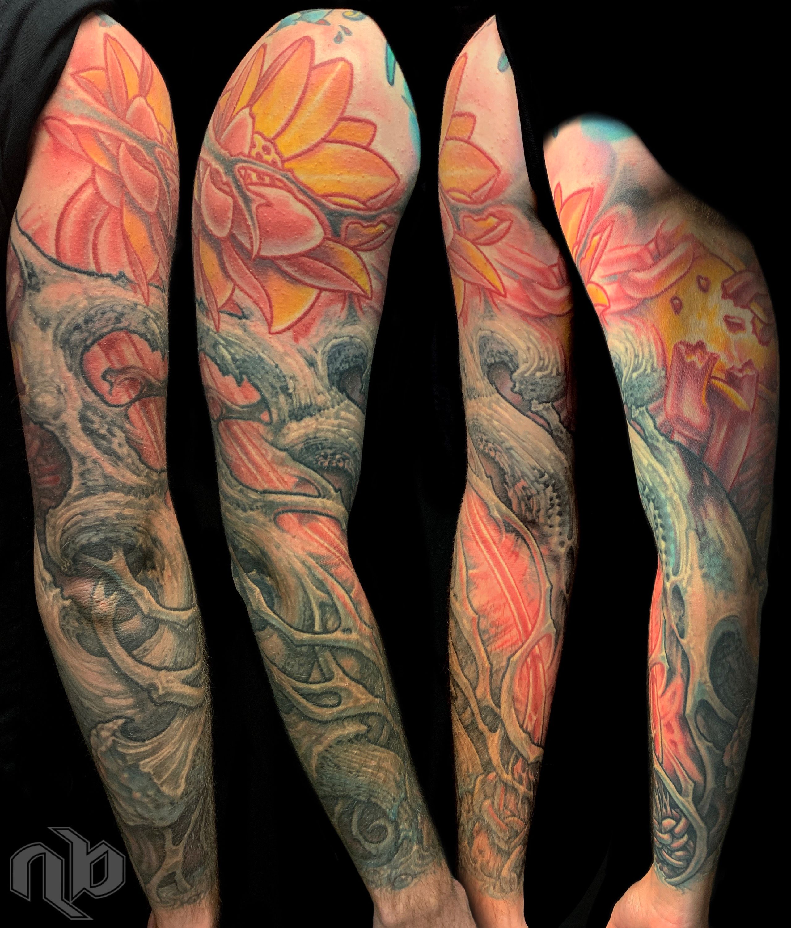 Four views show a large arm tattoo with orange-pink lotus flower, grey chains, and dark swirling vine-like bio-organic forms against black.