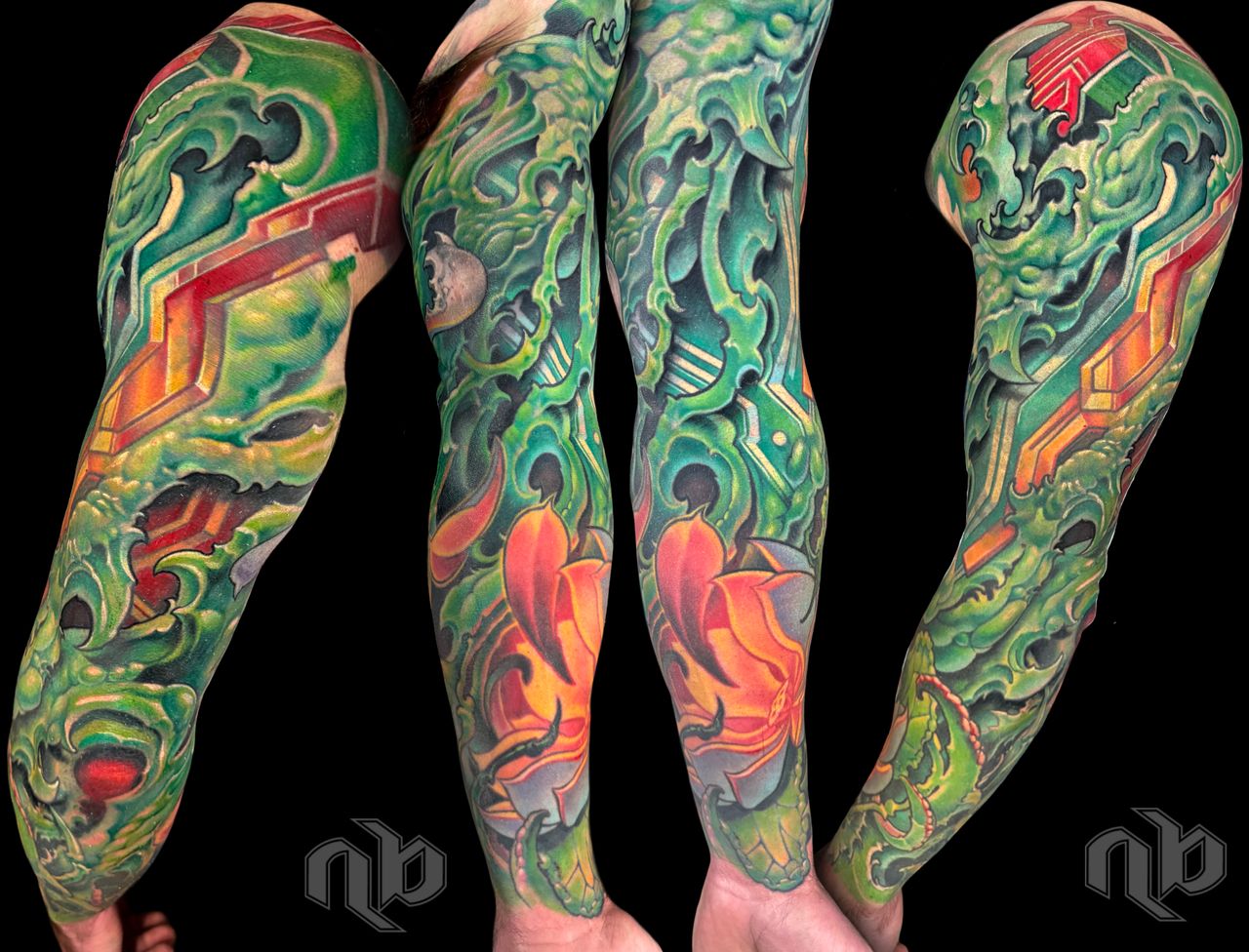 textured bio-organic color tattoo sleeve with lotus flower, vines, circuits, and complex coverup by Nick Baxter in Austin Texas