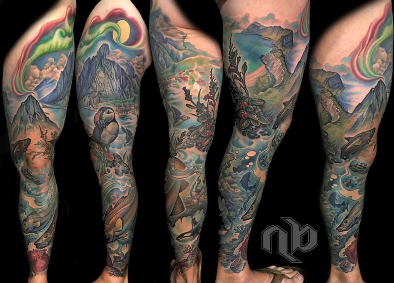 Five views show a large colorful leg tattoo featuring mountains, fjords, swirling aurora, puffins, fish, waves, and coastal plants.